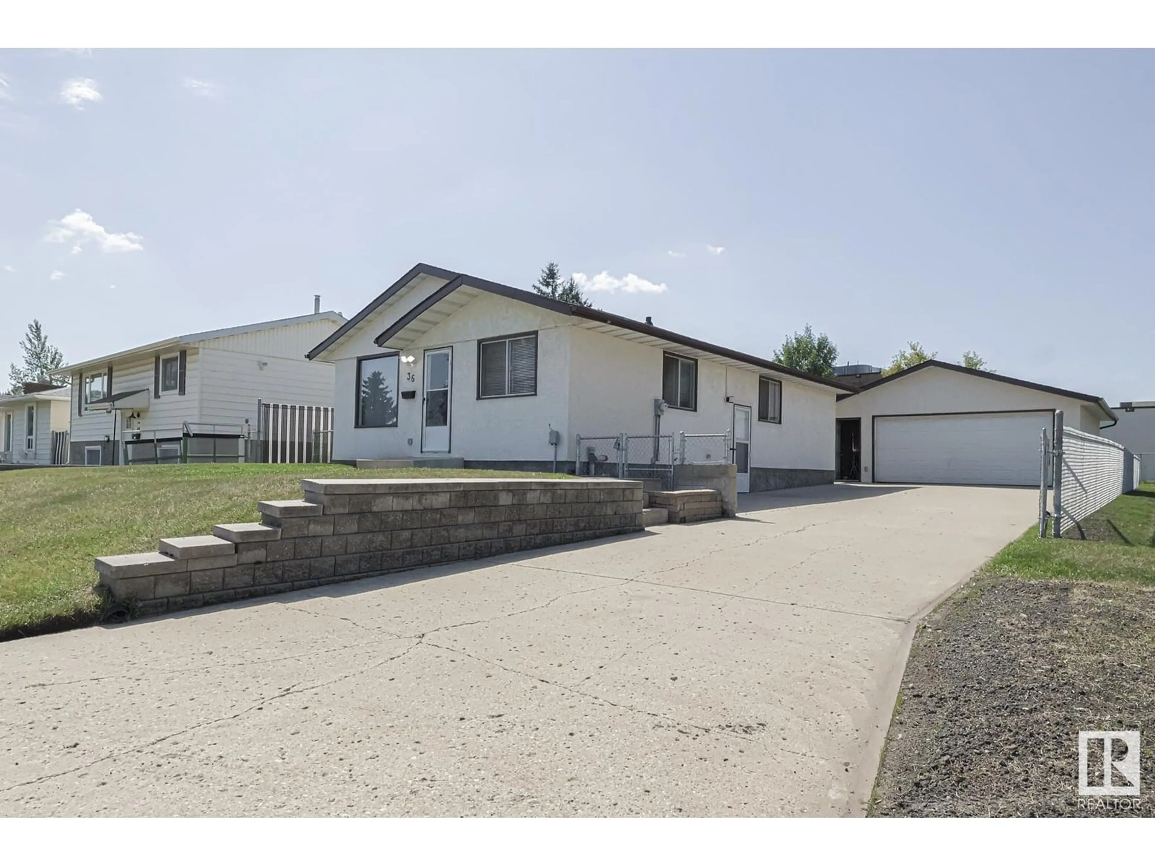 Home with vinyl exterior material, street for 36 HARROW CIRCLE, Edmonton Alberta T5A2S5