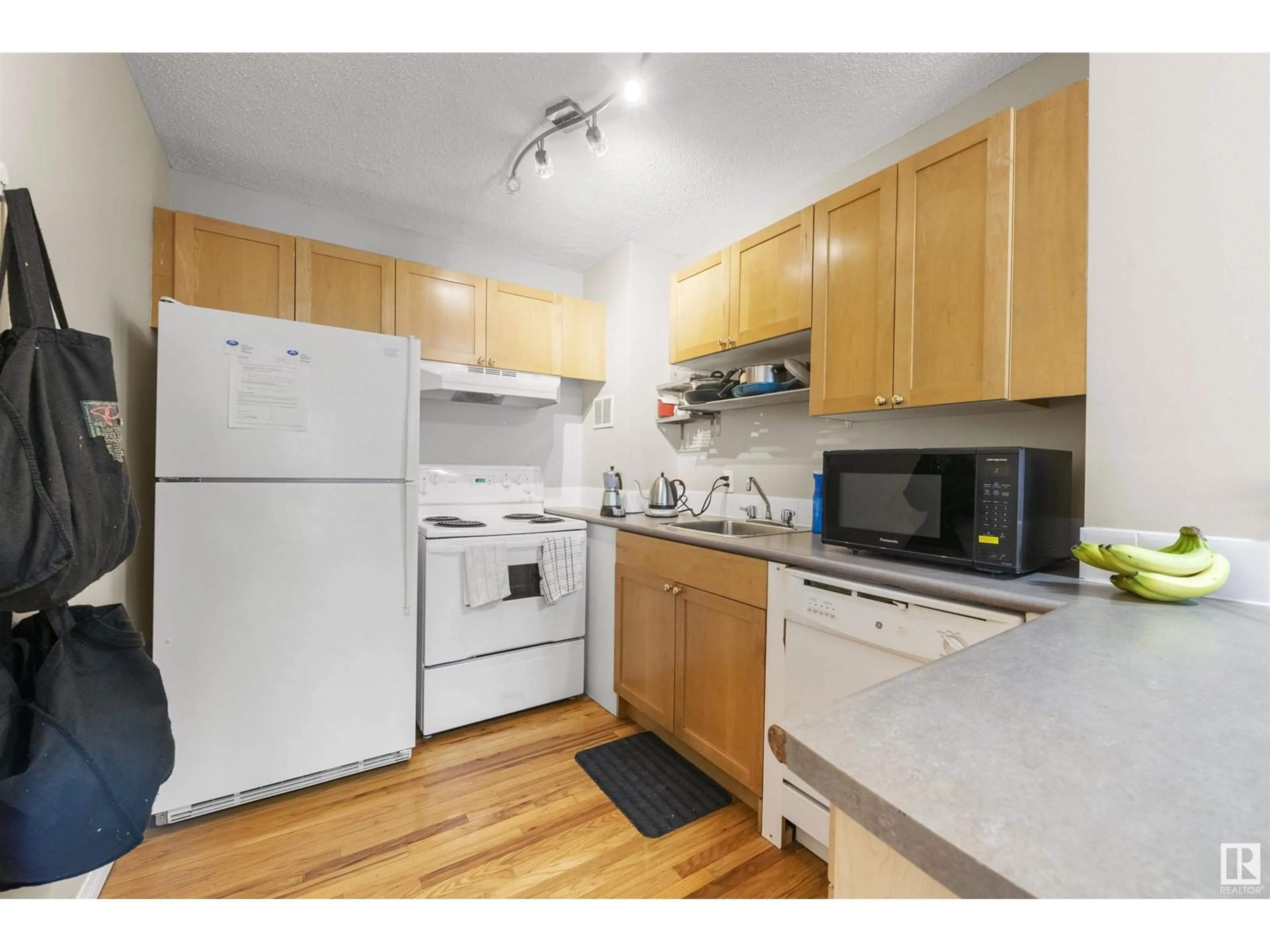 Standard kitchen, wood/laminate floor for #1002 - 9730 106 ST, Edmonton Alberta T5K1B7
