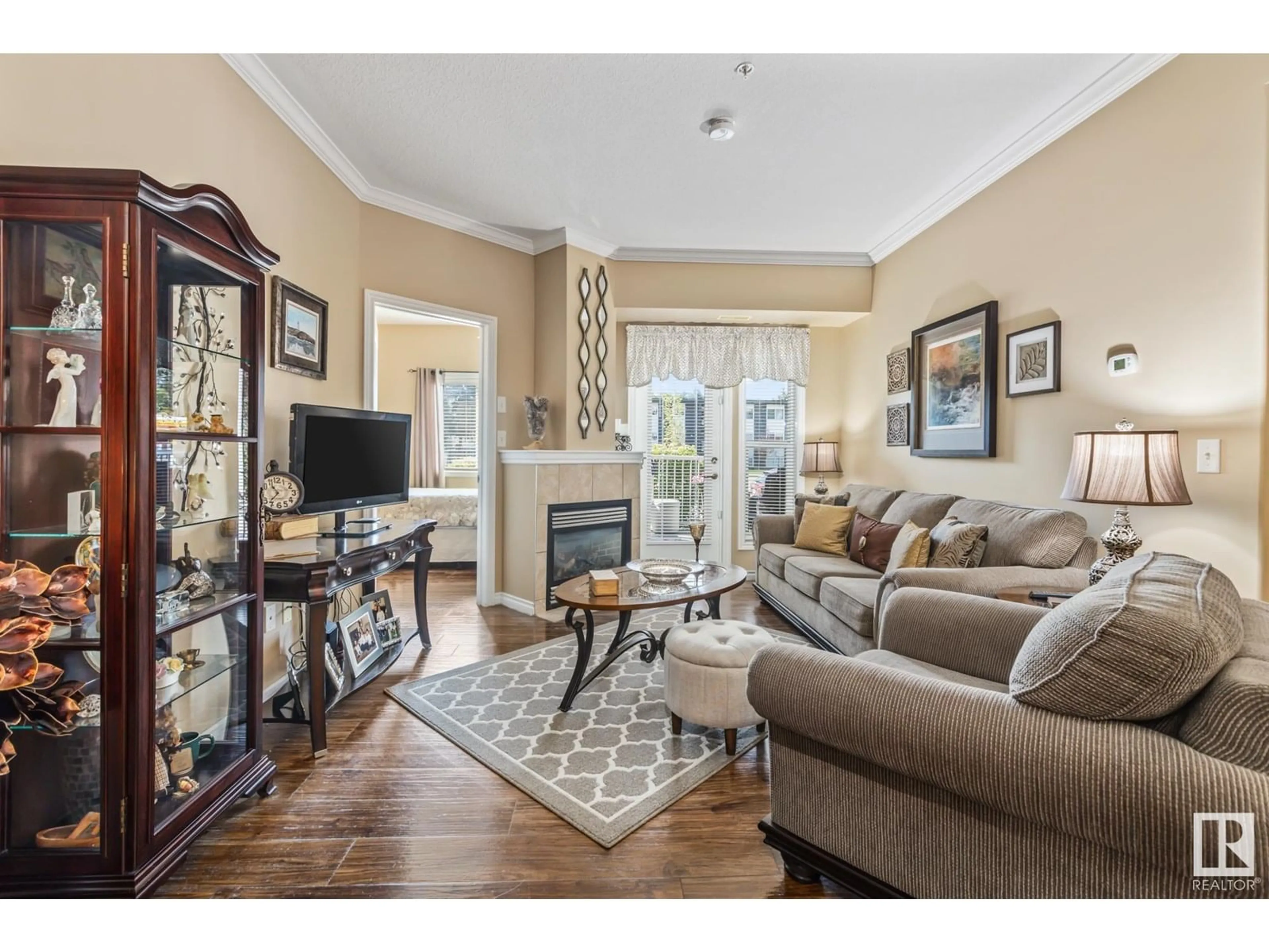 Living room with furniture, unknown for 8528 - 105 82 AV, Edmonton Alberta T6C0Y8