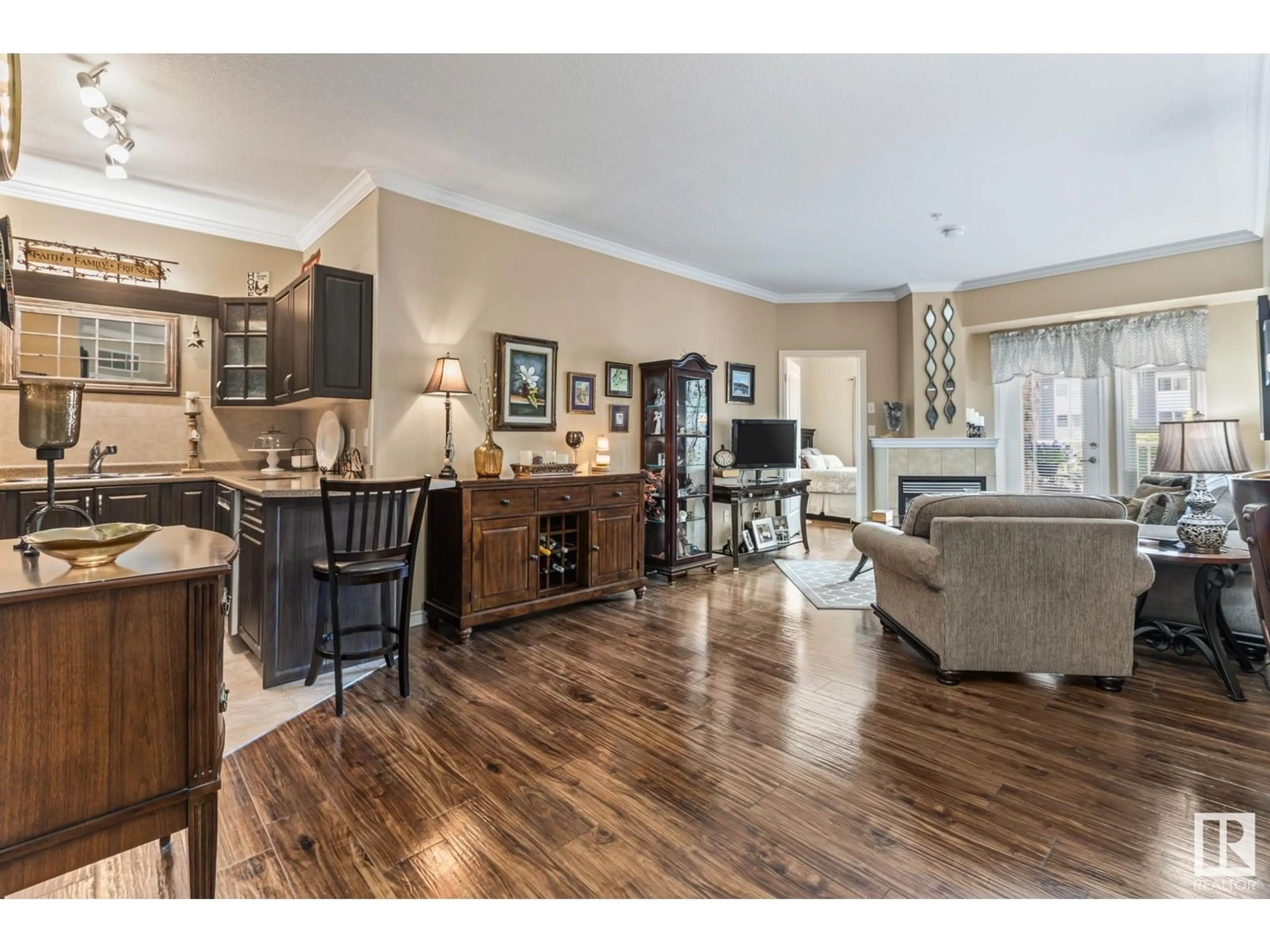 Open concept kitchen, wood/laminate floor for 8528 - 105 82 AV, Edmonton Alberta T6C0Y8