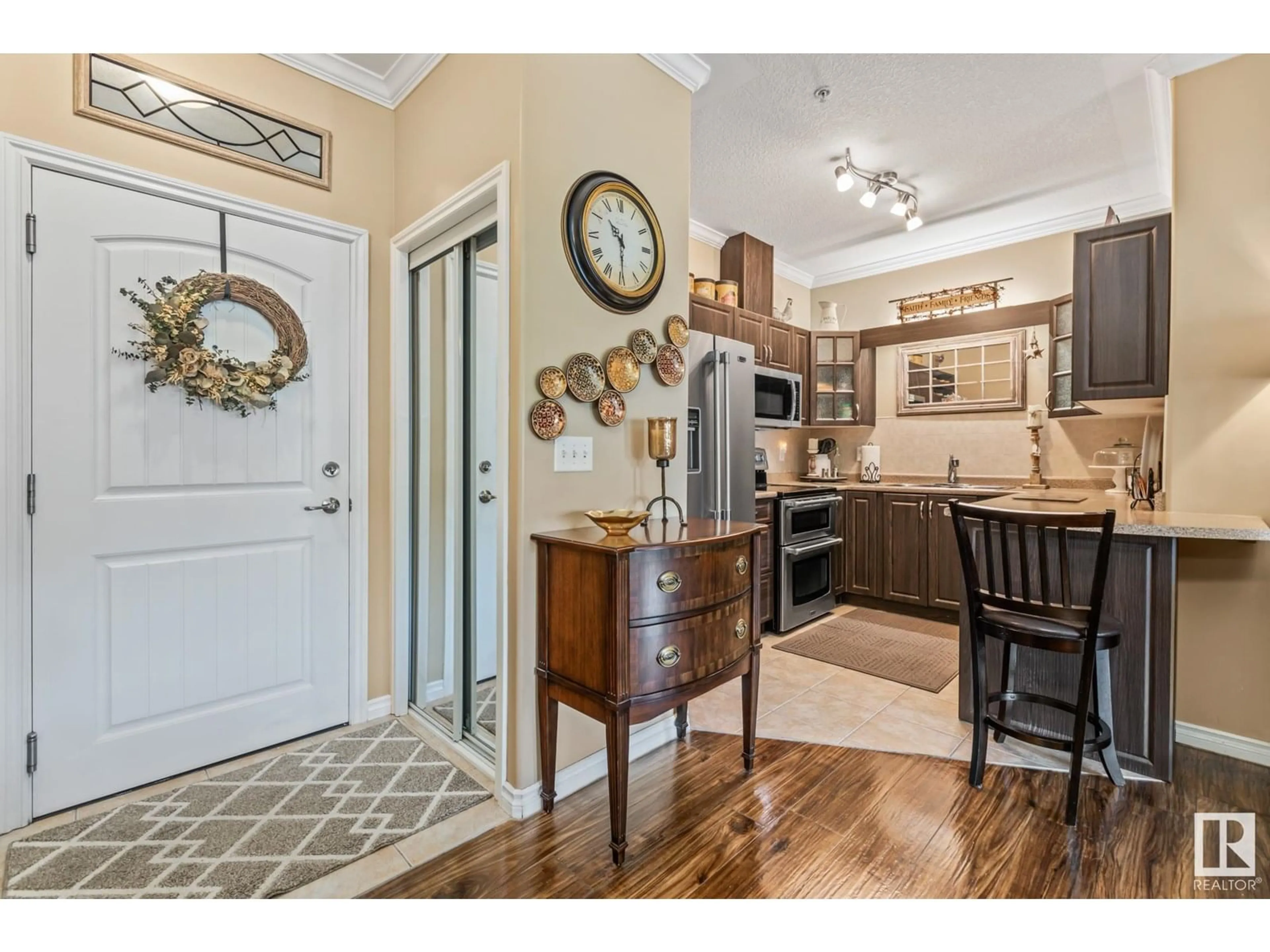Open concept kitchen, wood/laminate floor for 8528 - 105 82 AV, Edmonton Alberta T6C0Y8