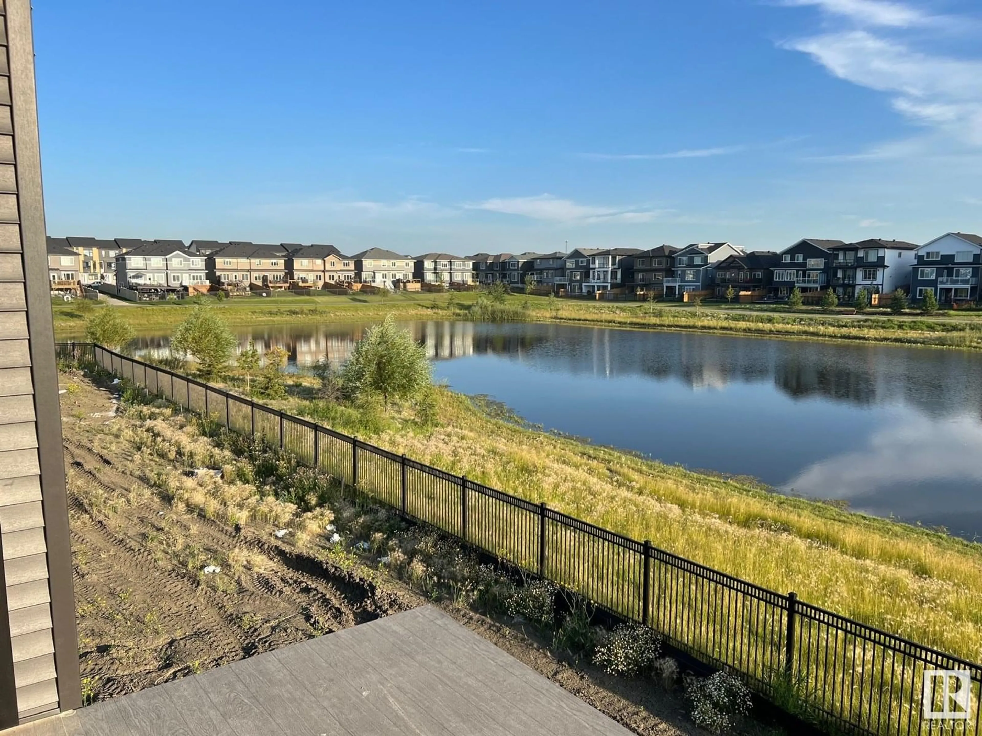A pic from outside/outdoor area/front of a property/back of a property/a pic from drone, water/lake/river/ocean view for 68 ELDRIDGE PT, St. Albert Alberta T8N8C4