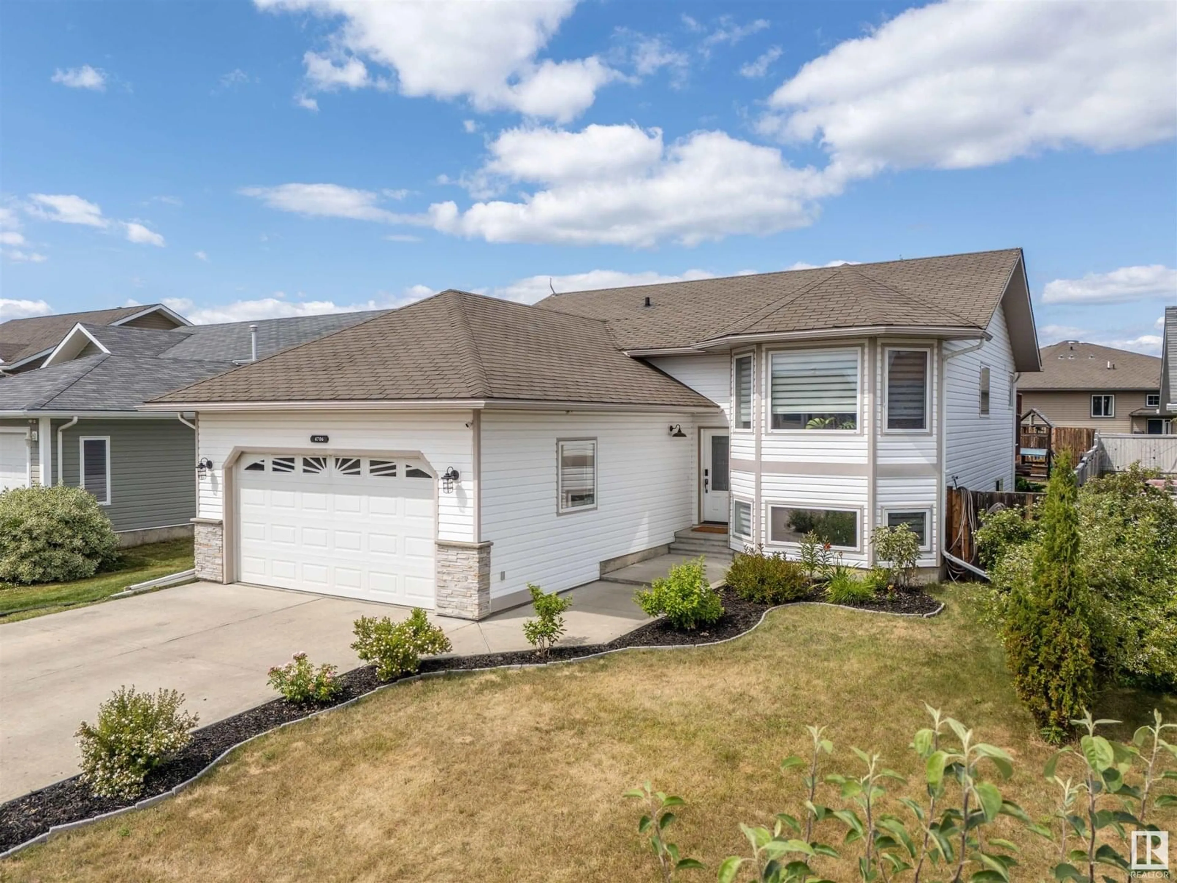Home with vinyl exterior material, street for 4706 64 AVE, Cold Lake Alberta T9M2E5