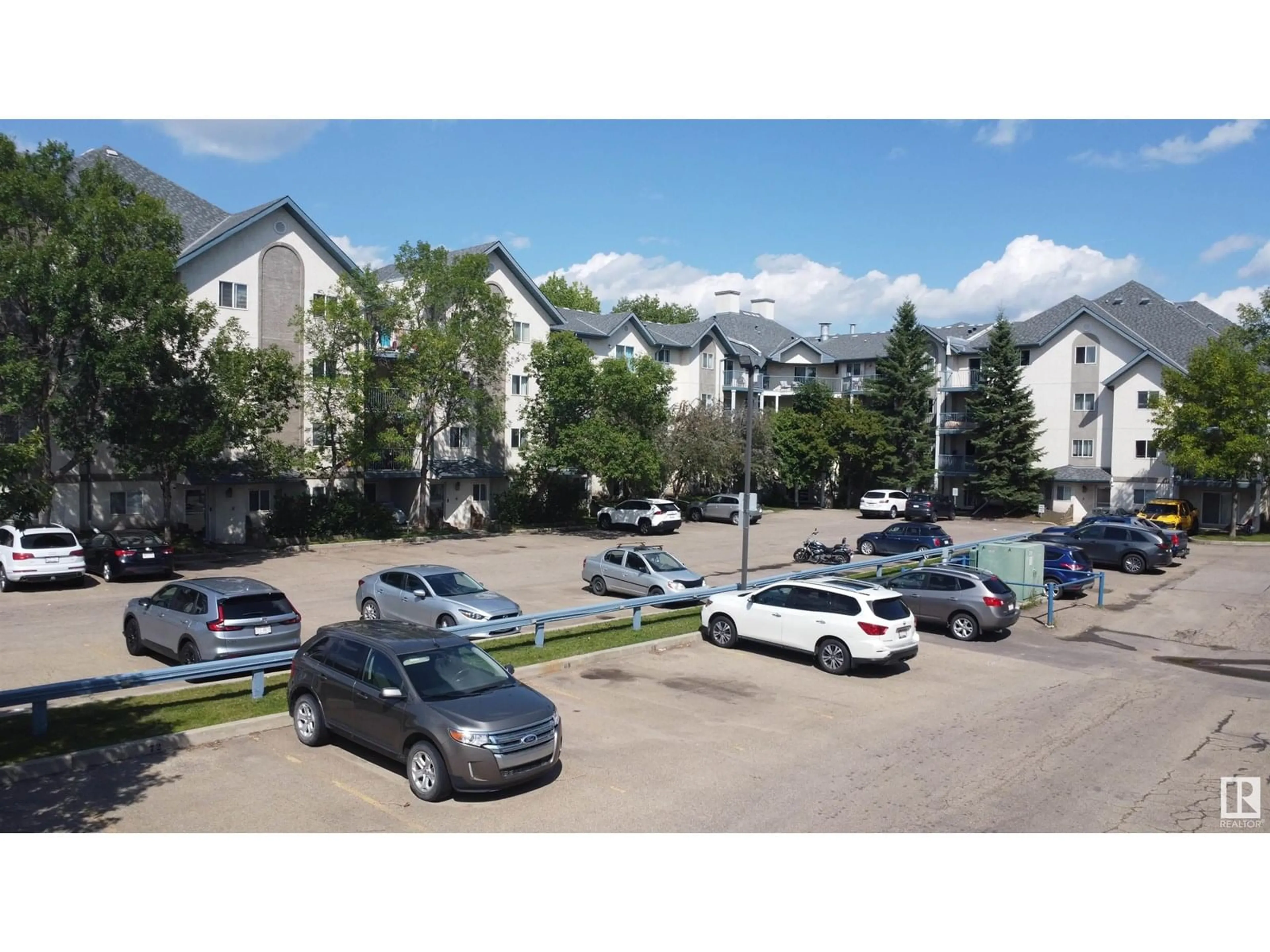 A pic from outside/outdoor area/front of a property/back of a property/a pic from drone, mountain view for 422 - 2520 50 ST, Edmonton Alberta T6L7A8