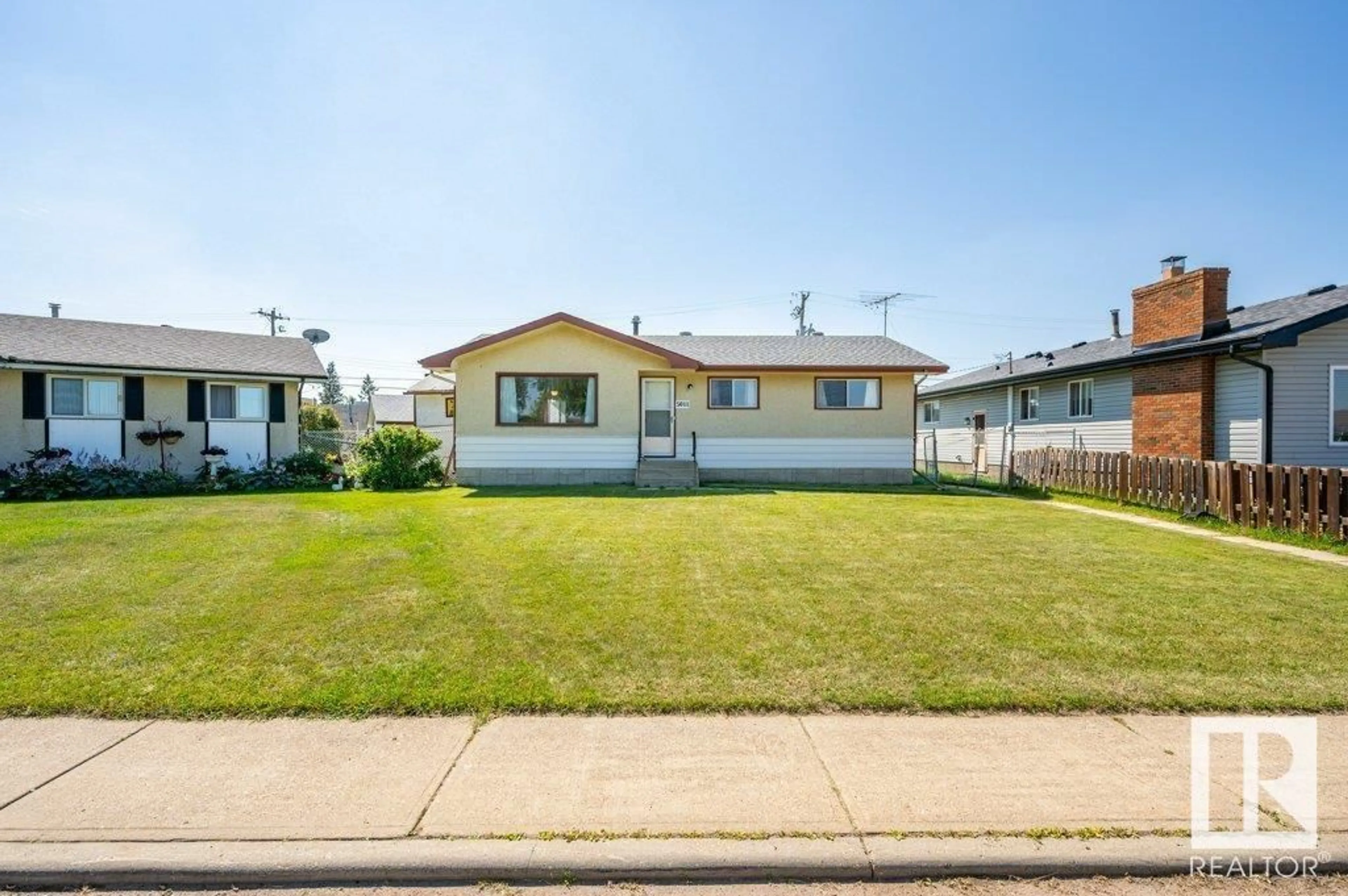 Home with vinyl exterior material, street for 5011 47 ST, Gibbons Alberta T0A1N0