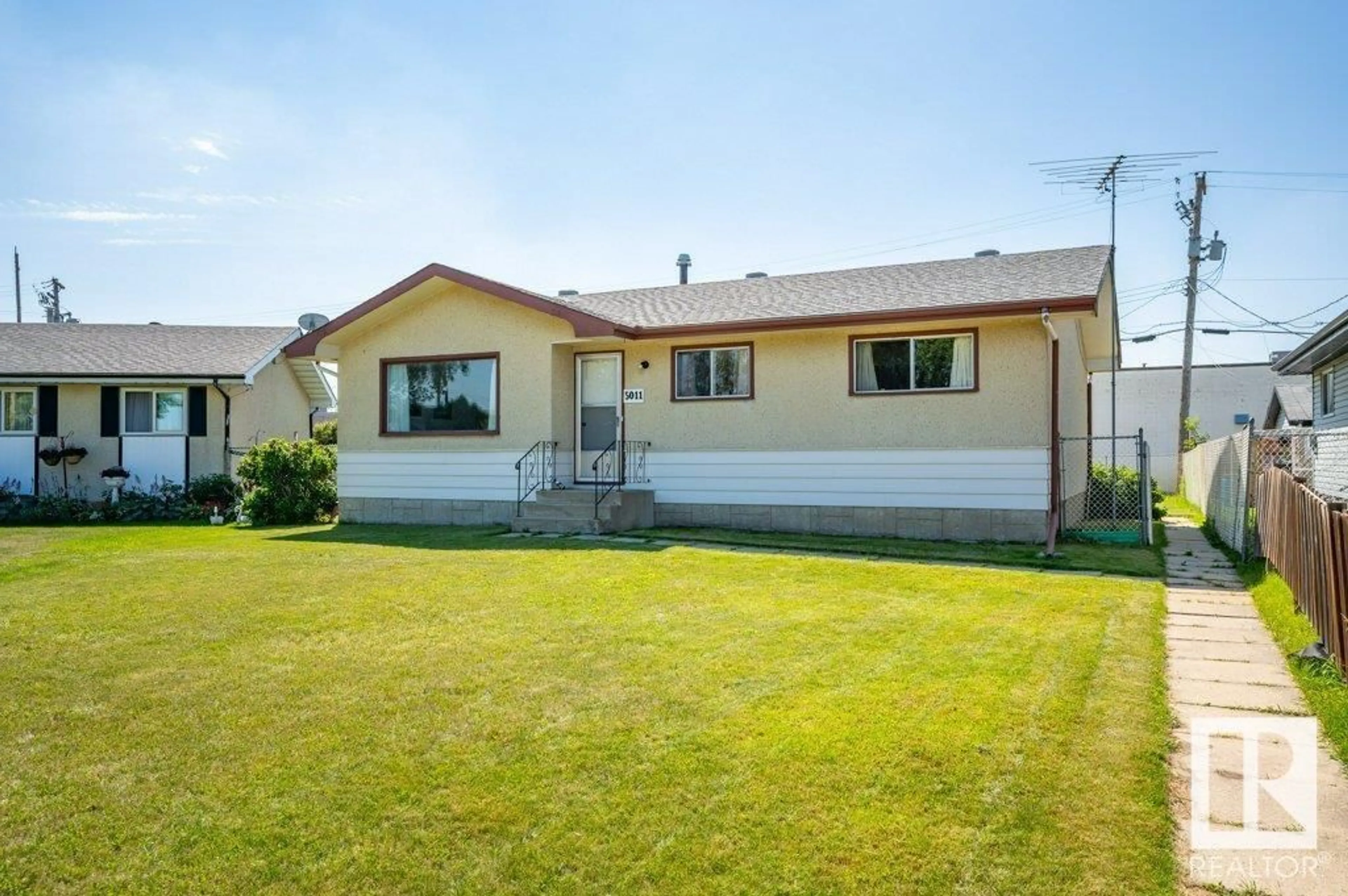 Home with vinyl exterior material, street for 5011 47 ST, Gibbons Alberta T0A1N0