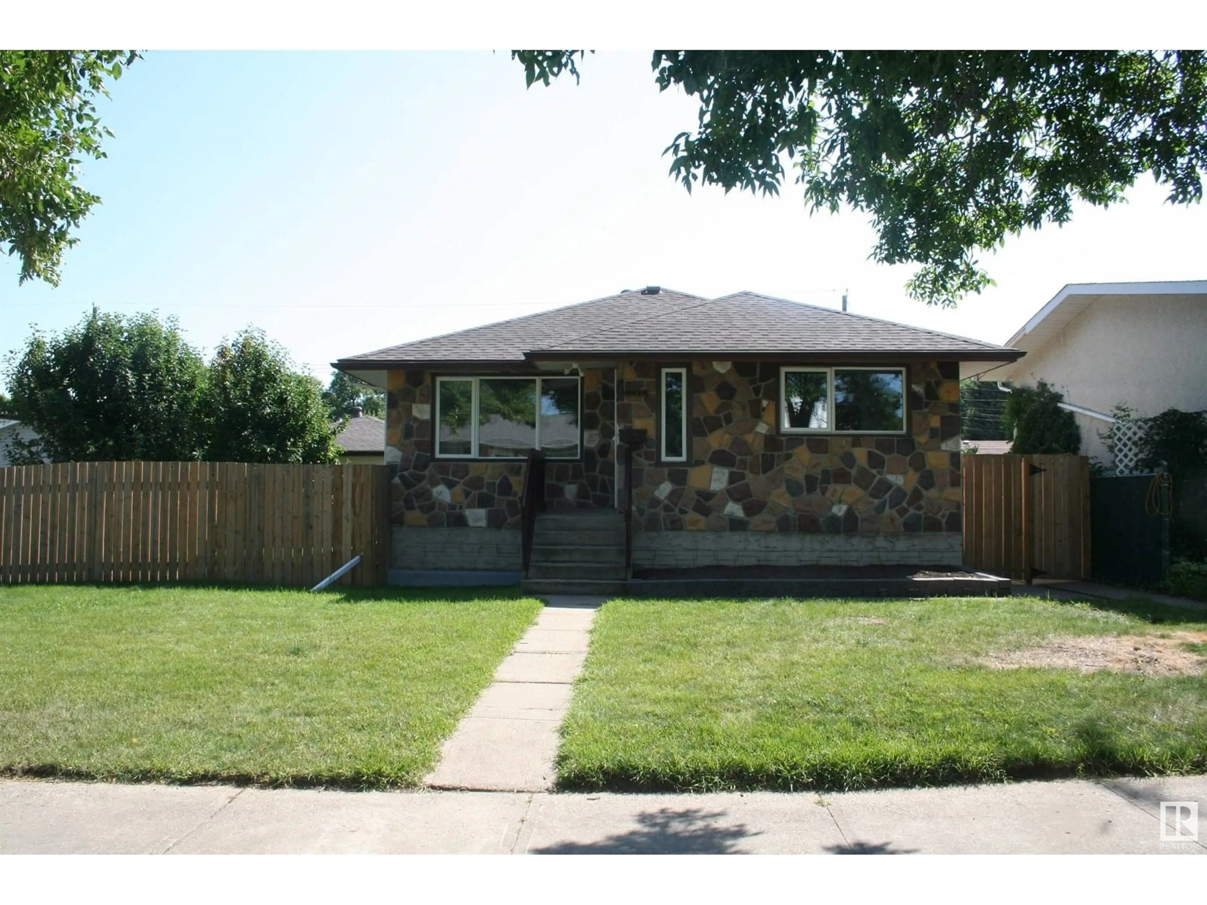 Home with brick exterior material, street for NW - 11823 43 ST, Edmonton Alberta T5W2P3