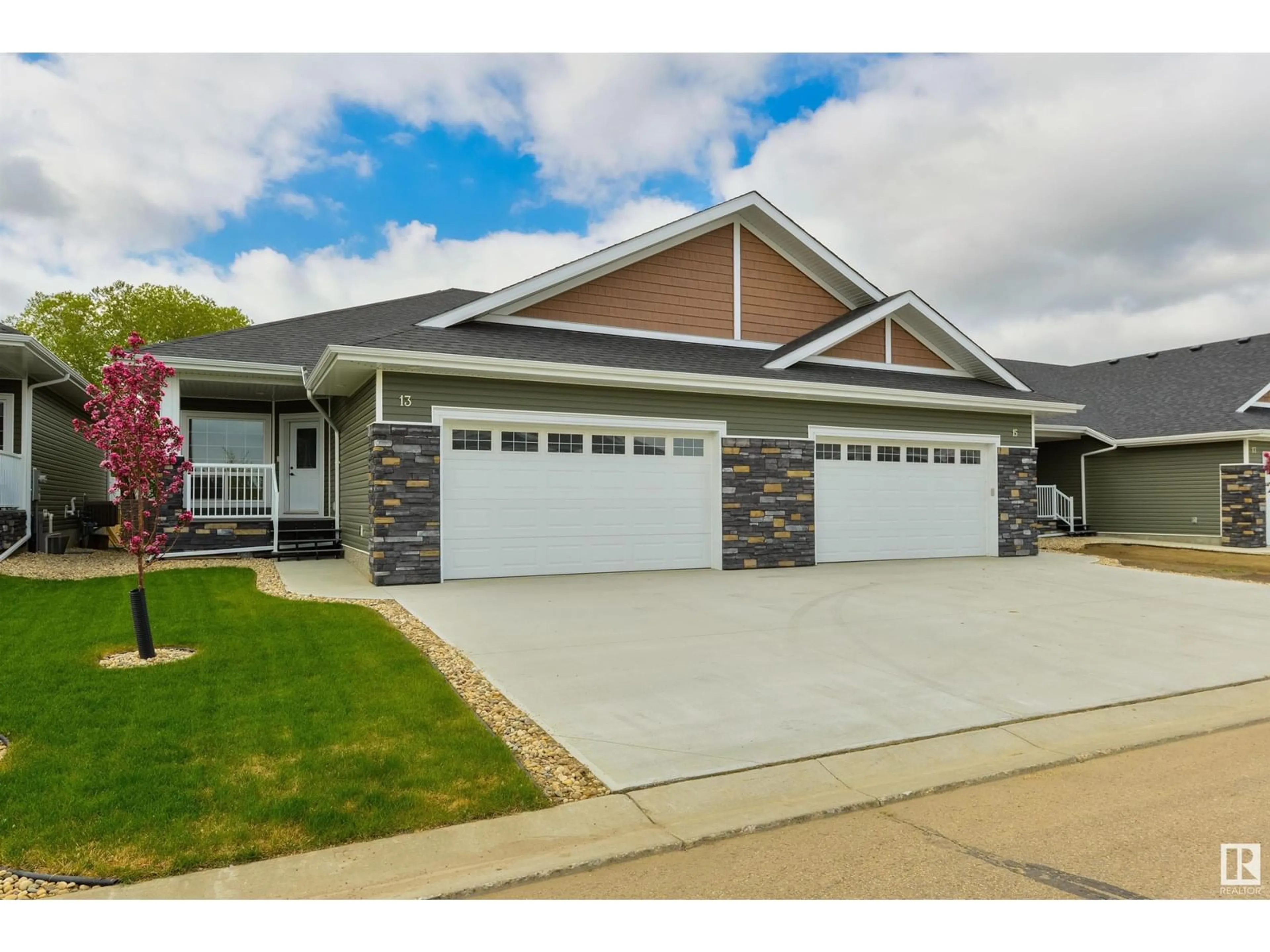 Home with vinyl exterior material, street for 13 - 1005 CALAHOO RD, Spruce Grove Alberta T7X2T7