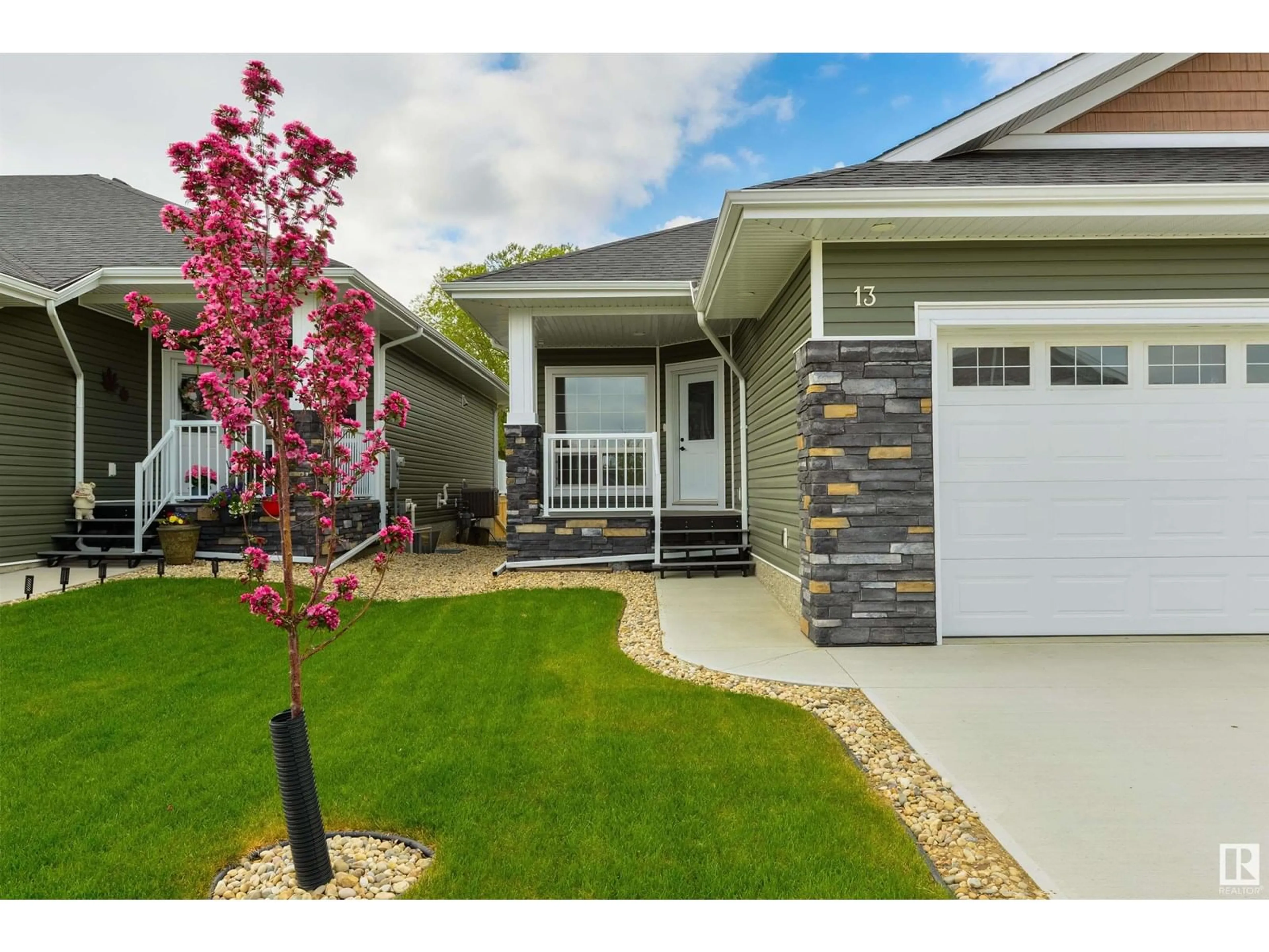 Home with vinyl exterior material, street for 13 - 1005 CALAHOO RD, Spruce Grove Alberta T7X2T7