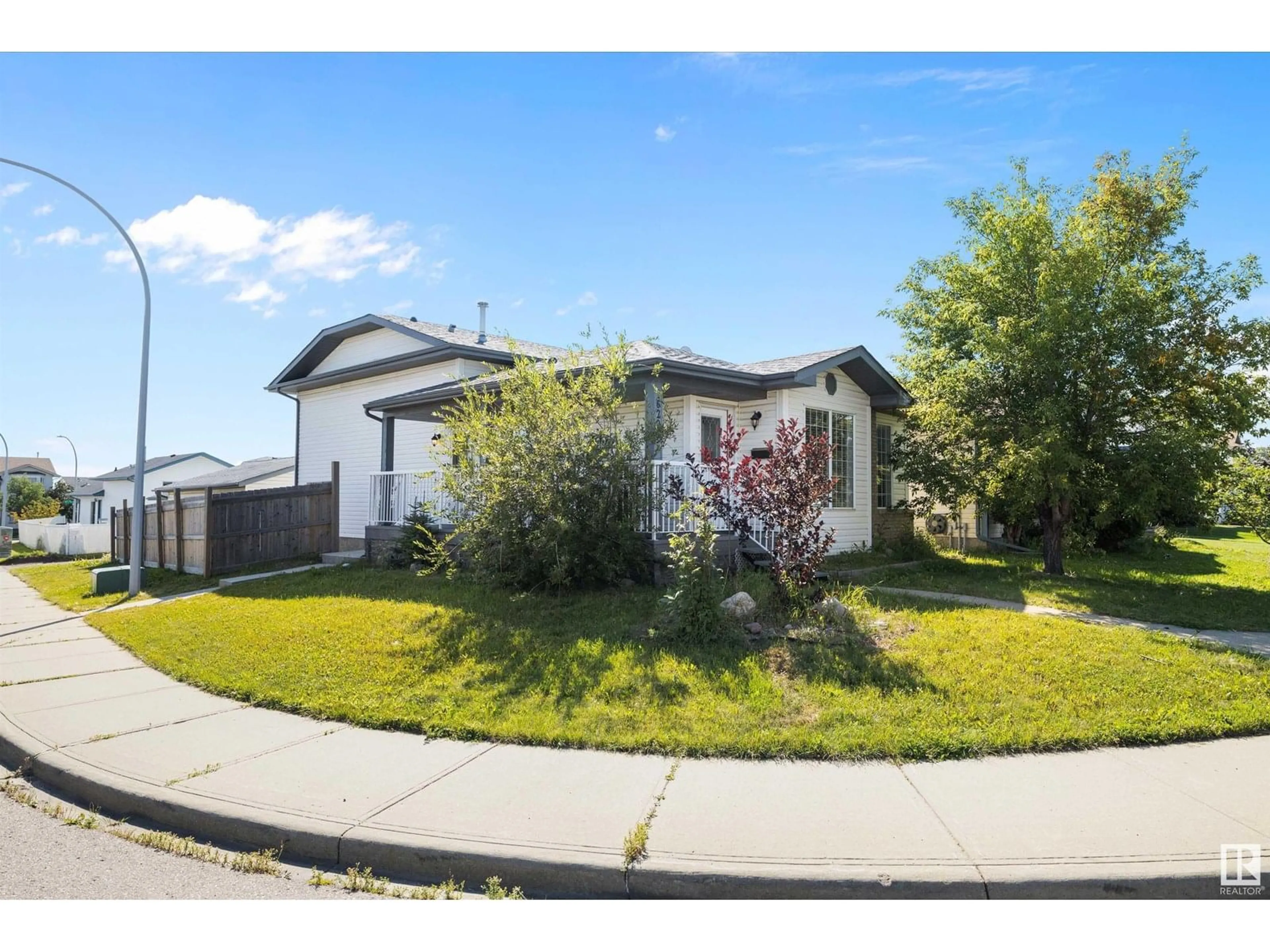 Home with vinyl exterior material, street for 16229 57 ST, Edmonton Alberta T5Y2V2