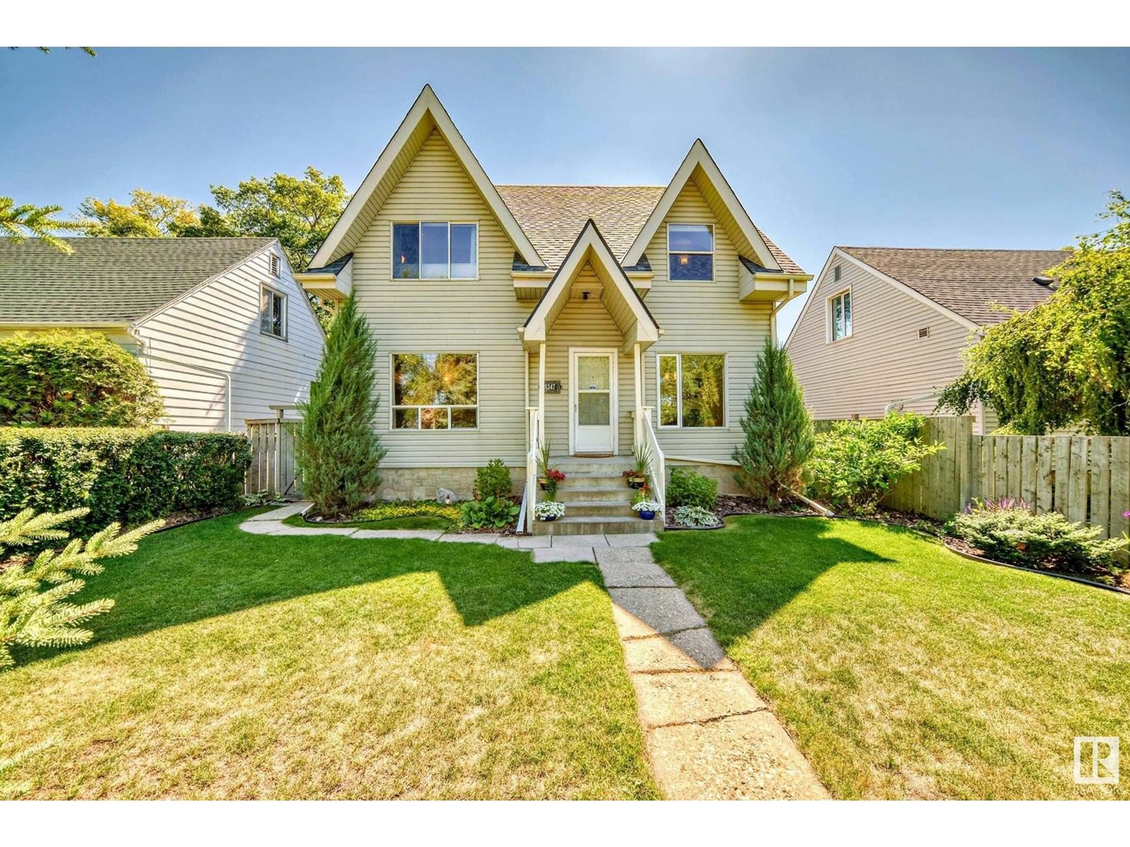 Home with vinyl exterior material, street for 8347 81 AV, Edmonton Alberta T6C0W1