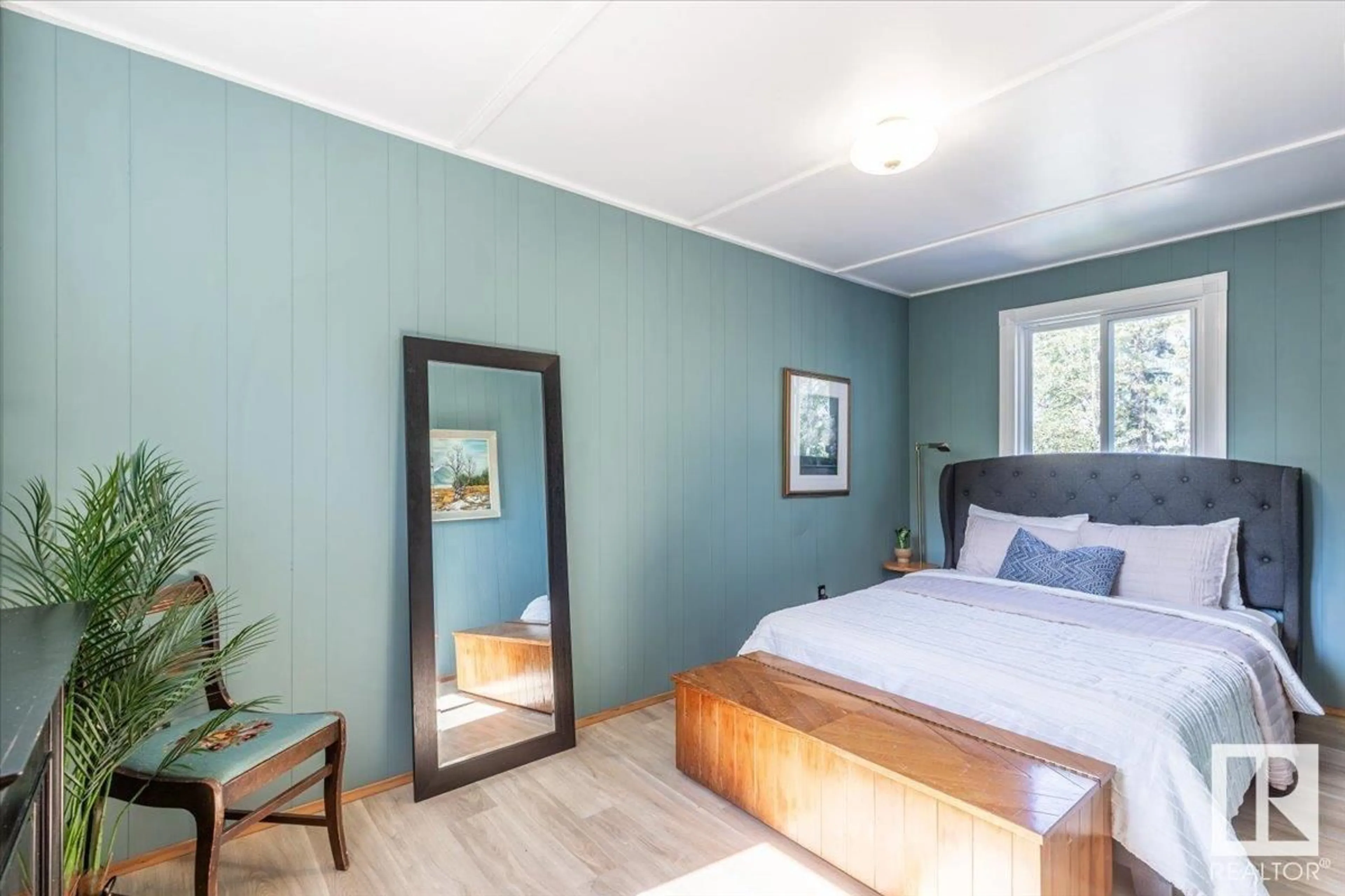Bedroom with bed, wood/laminate floor for 101 1ST AVE, Rural Wetaskiwin County Alberta T0C1X0