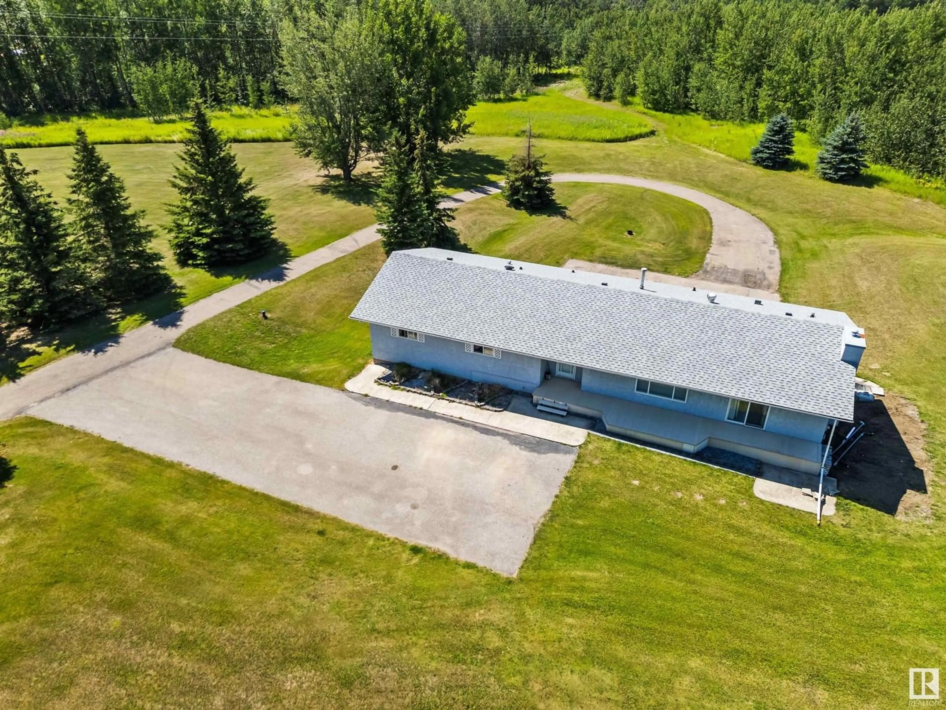 A pic from outside/outdoor area/front of a property/back of a property/a pic from drone, unknown for #9 - 53112 RGE ROAD 20, Rural Parkland County Alberta T7X2G8