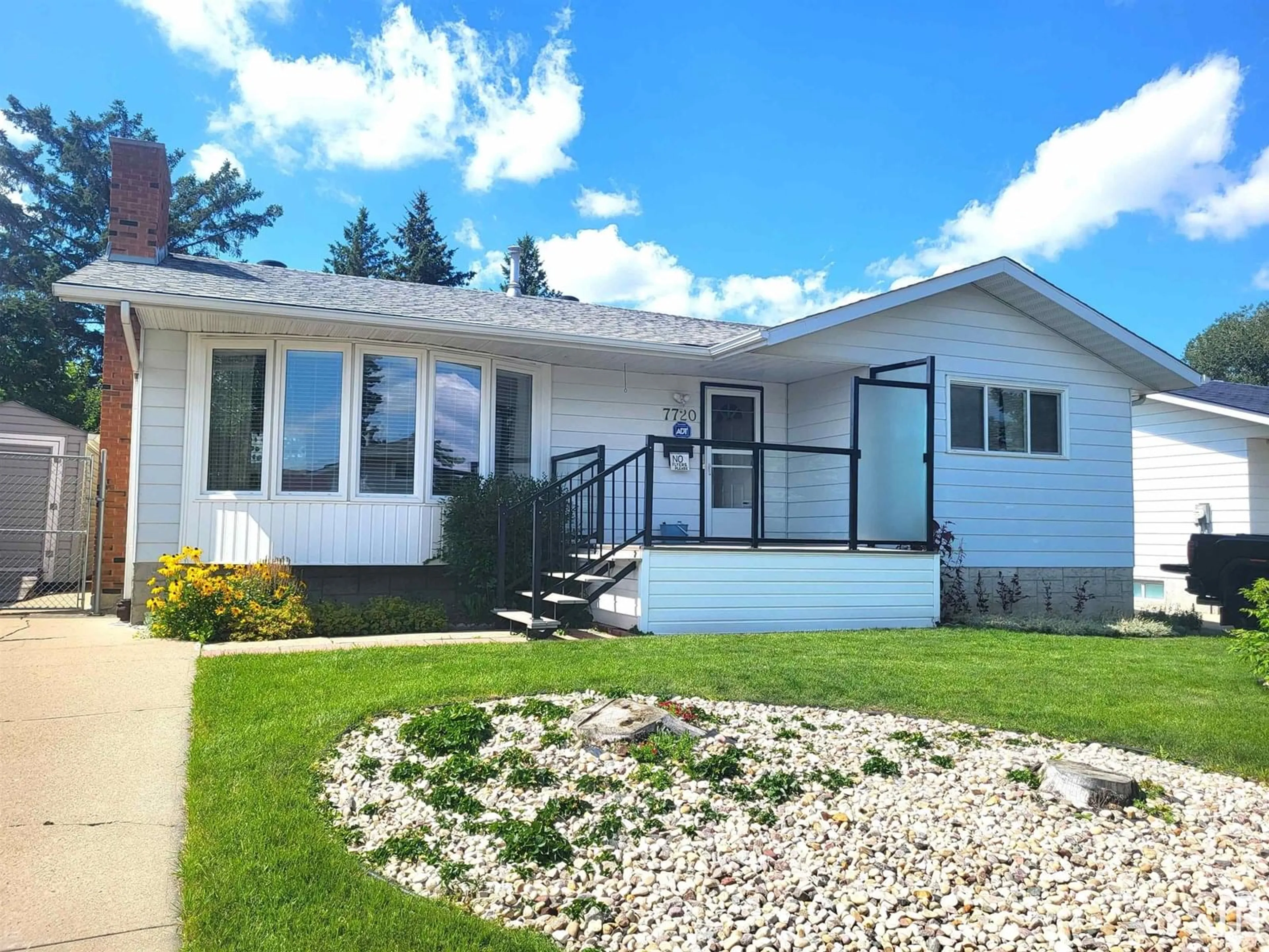 Home with vinyl exterior material, street for 7720 175 ST, Edmonton Alberta T5T0G8