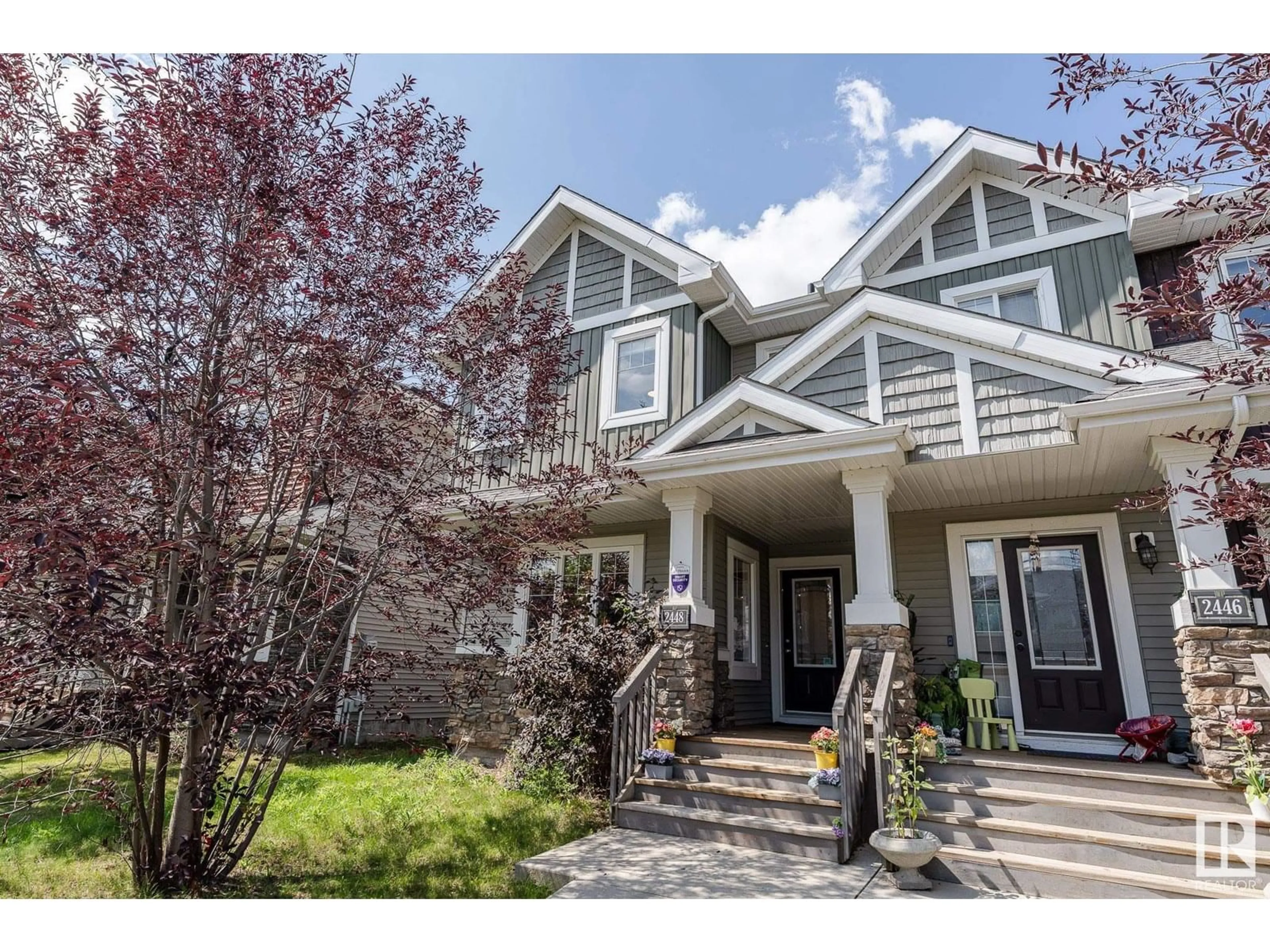 Home with vinyl exterior material, street for 2448 GLENRIDDING BV, Edmonton Alberta T6W2T4