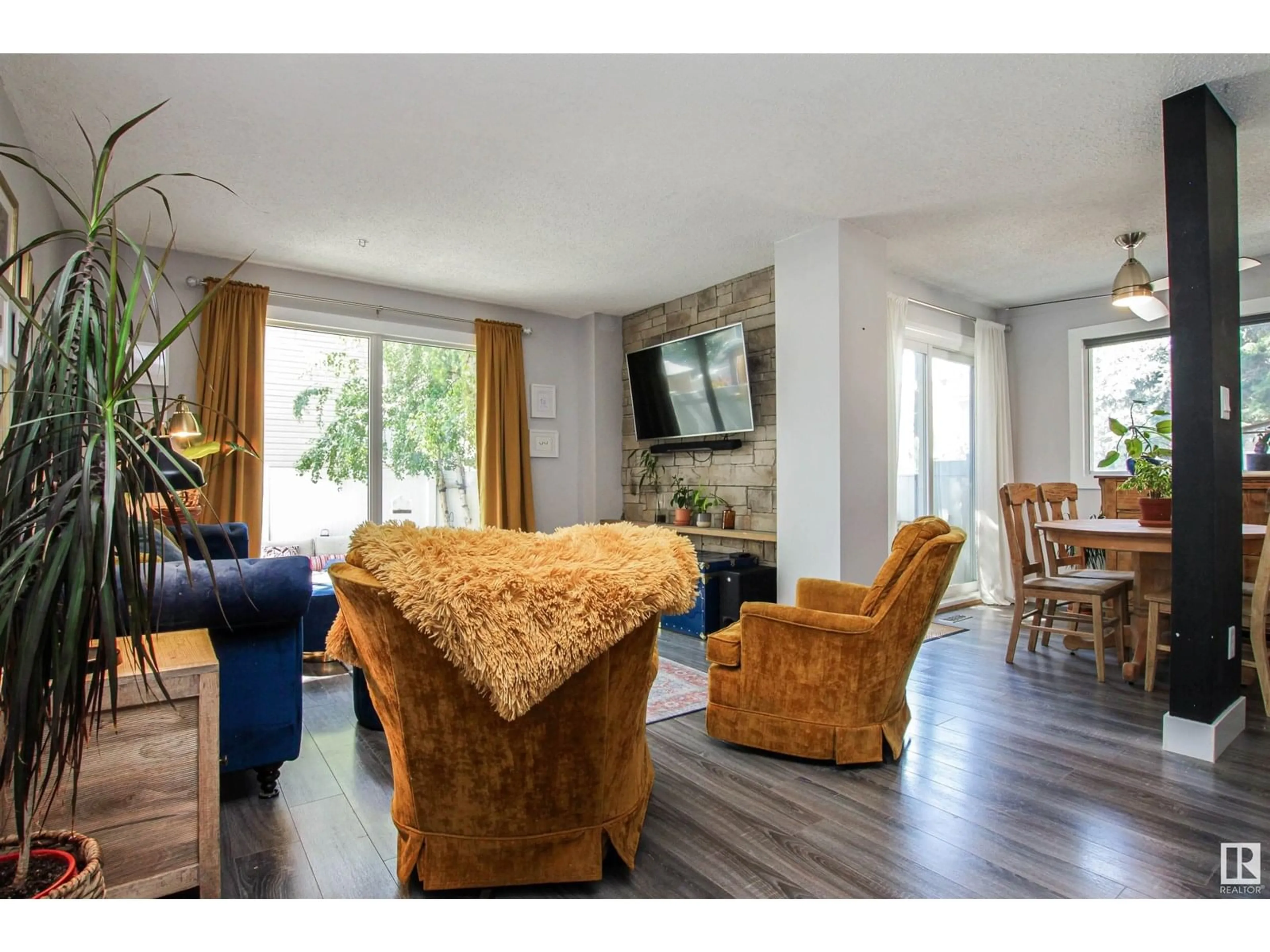 Living room with furniture, wood/laminate floor for #128 - 128 BROOKWOOD DR, Spruce Grove Alberta T7X1A6
