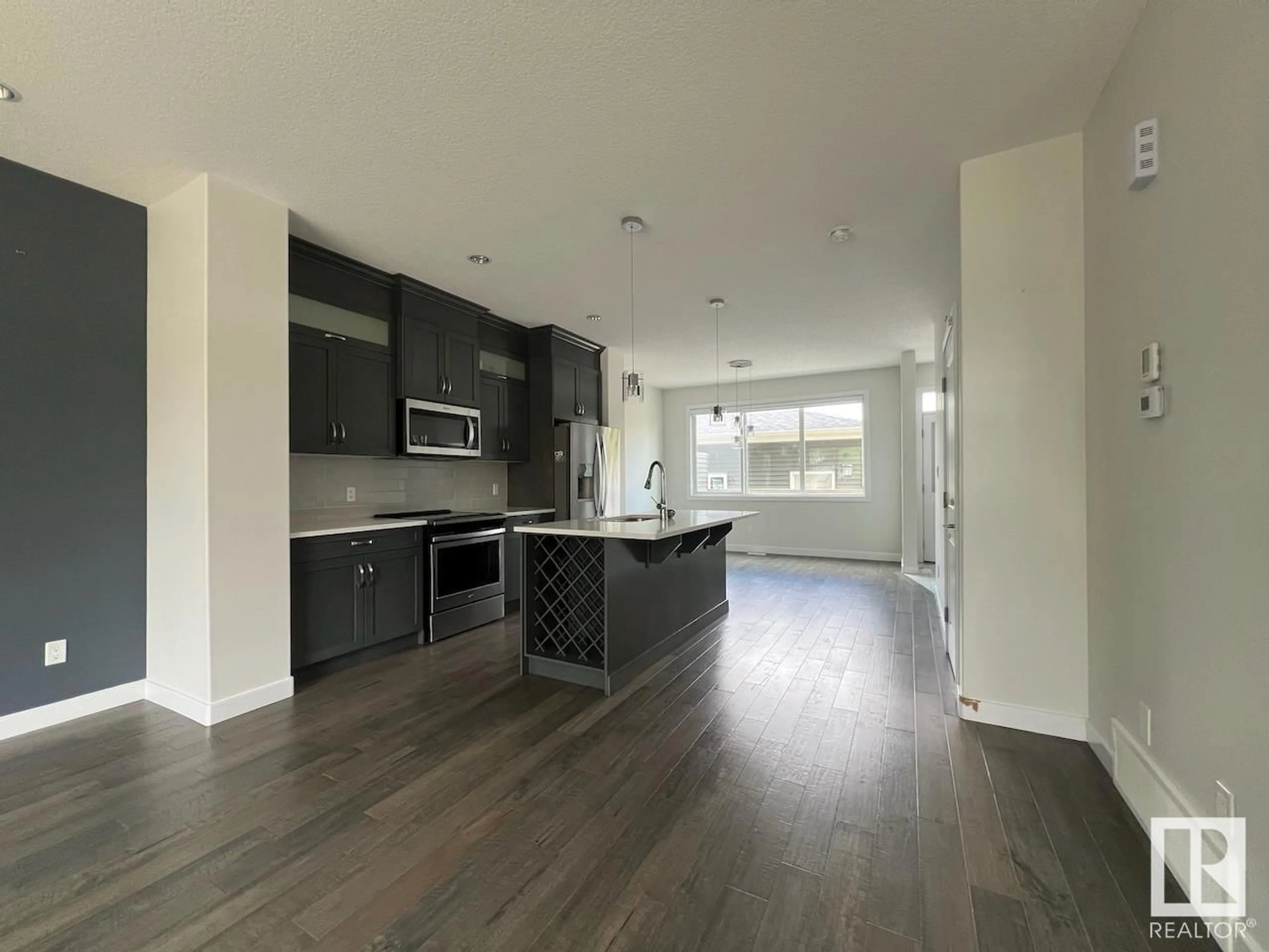 Open concept kitchen, unknown for 10574 62 AV, Edmonton Alberta T6H1M4