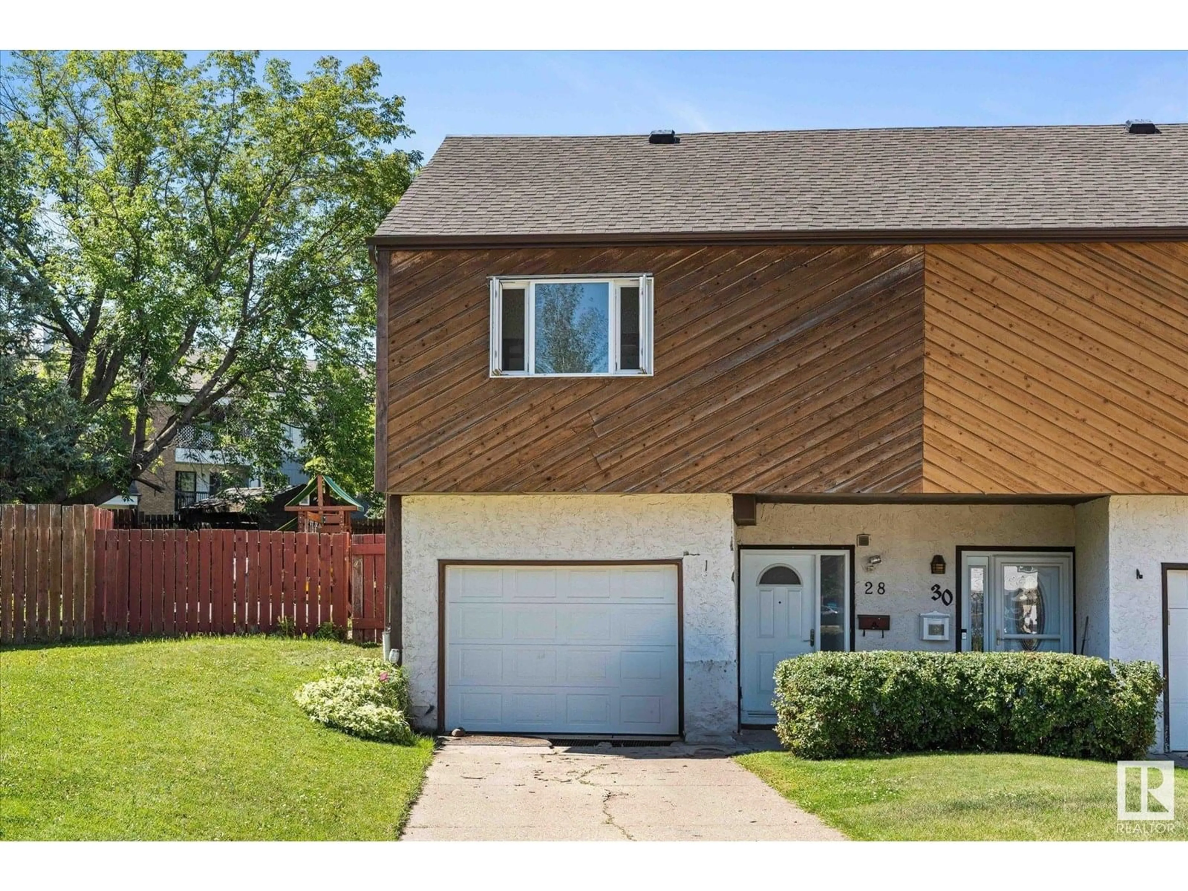 Home with vinyl exterior material, street for 28 HOMESTEAD CR, Edmonton Alberta T5A2Y3