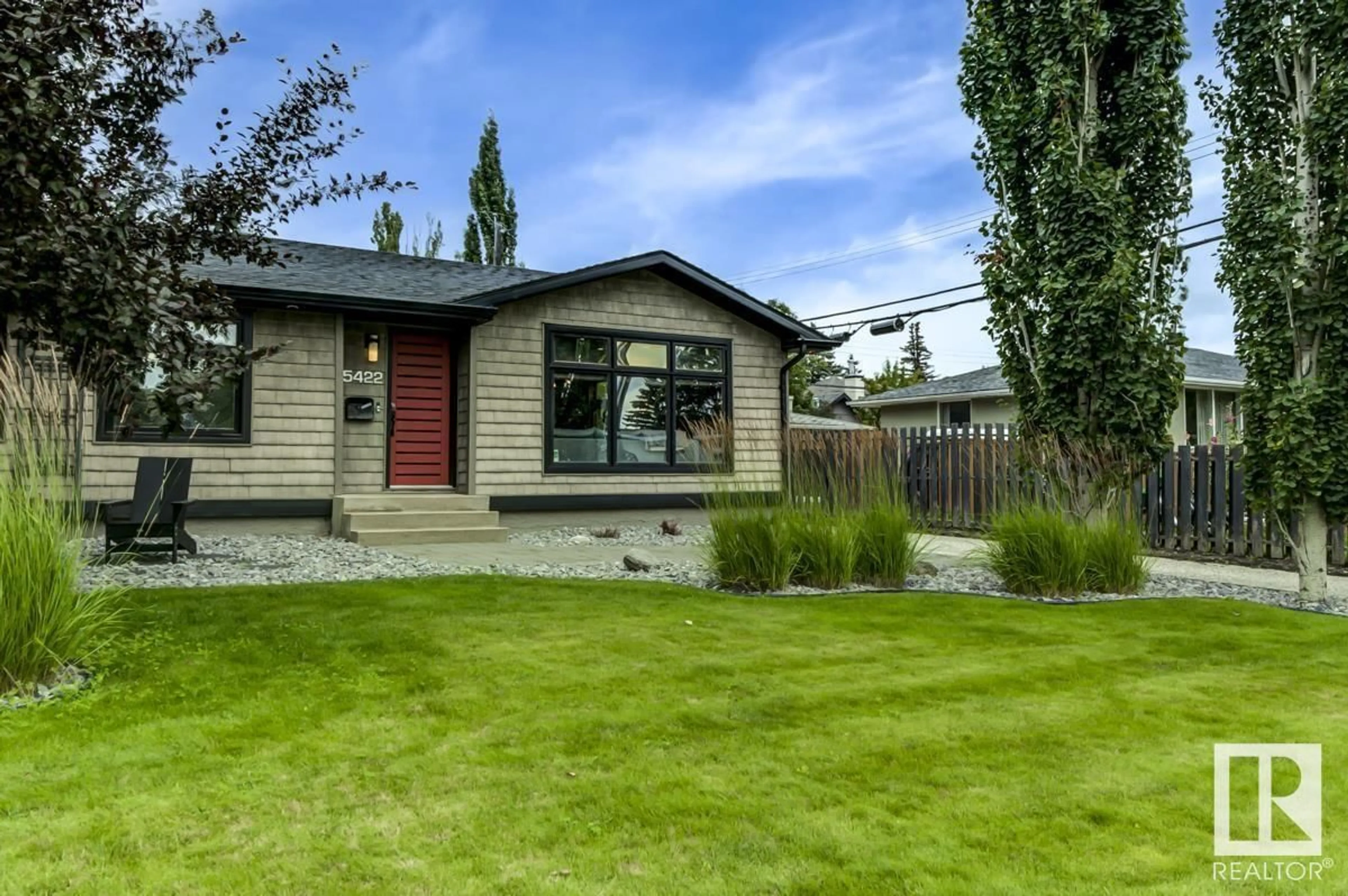 Home with vinyl exterior material, street for 15422 74 AV, Edmonton Alberta T5R2Y4