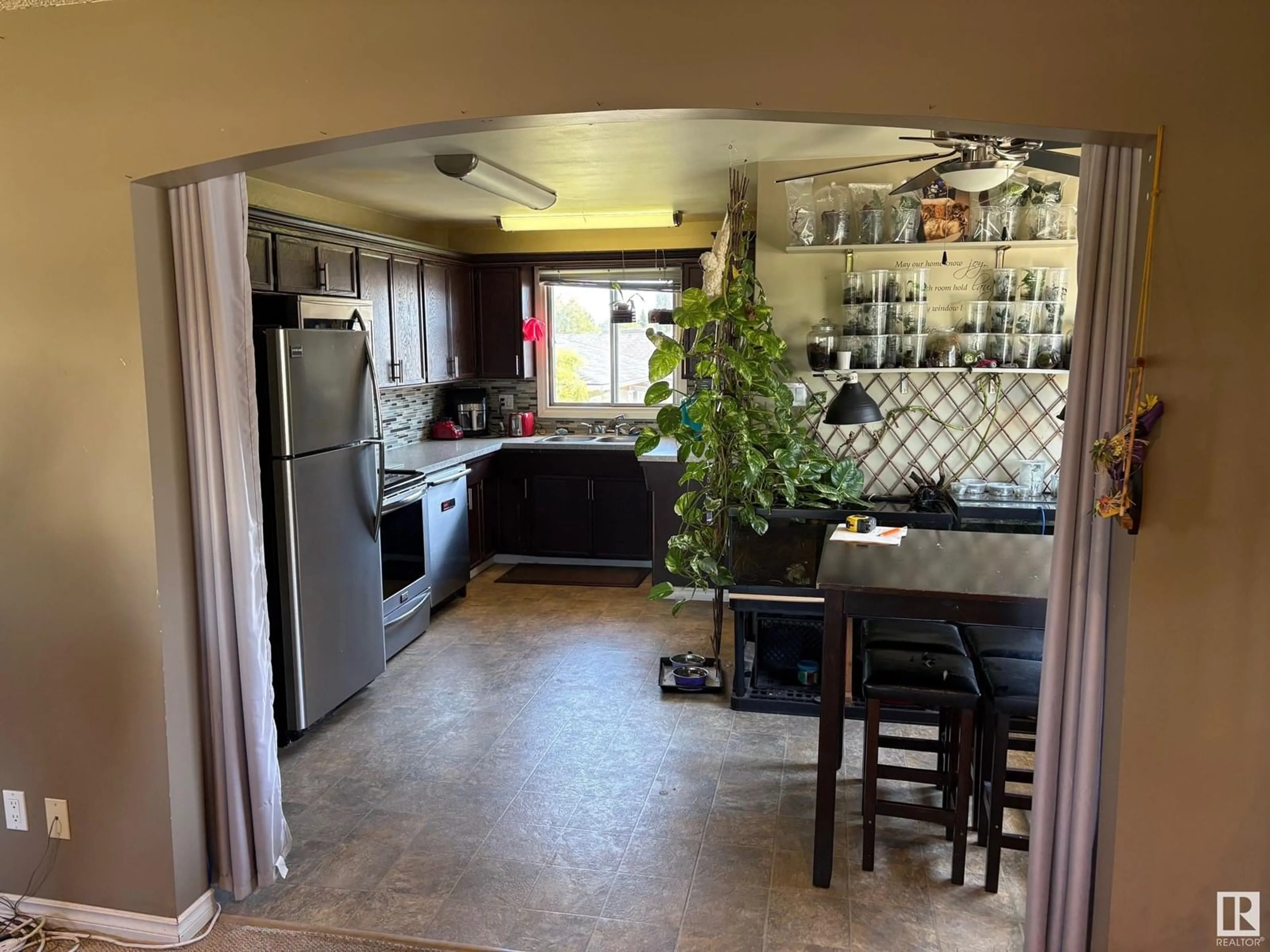Open concept kitchen, ceramic/tile floor for 13435 73 ST, Edmonton Alberta T5T0T9
