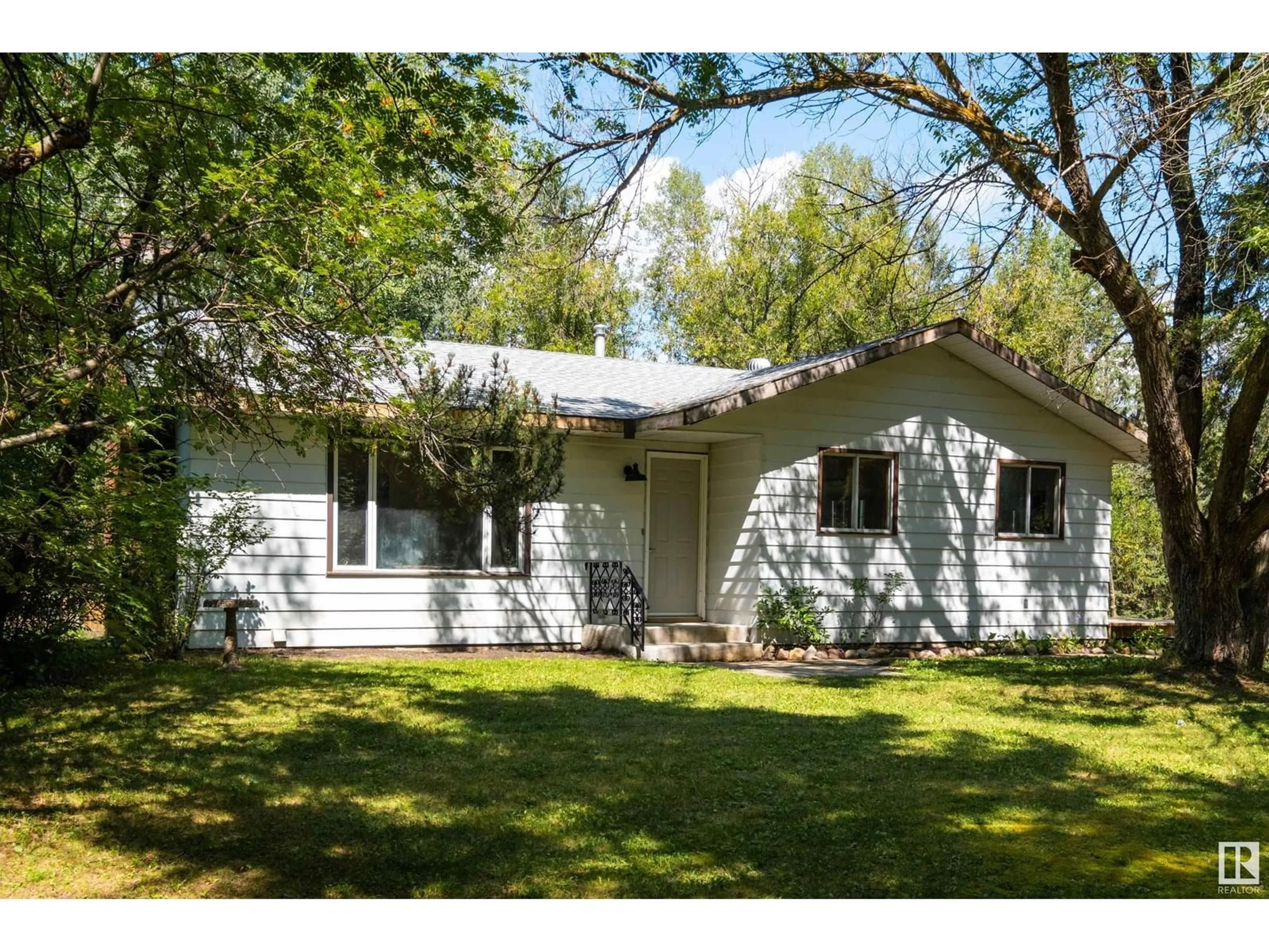 Home with vinyl exterior material, street for 60 2304 TWP ROAD 522, Rural Parkland County Alberta T0E0H0