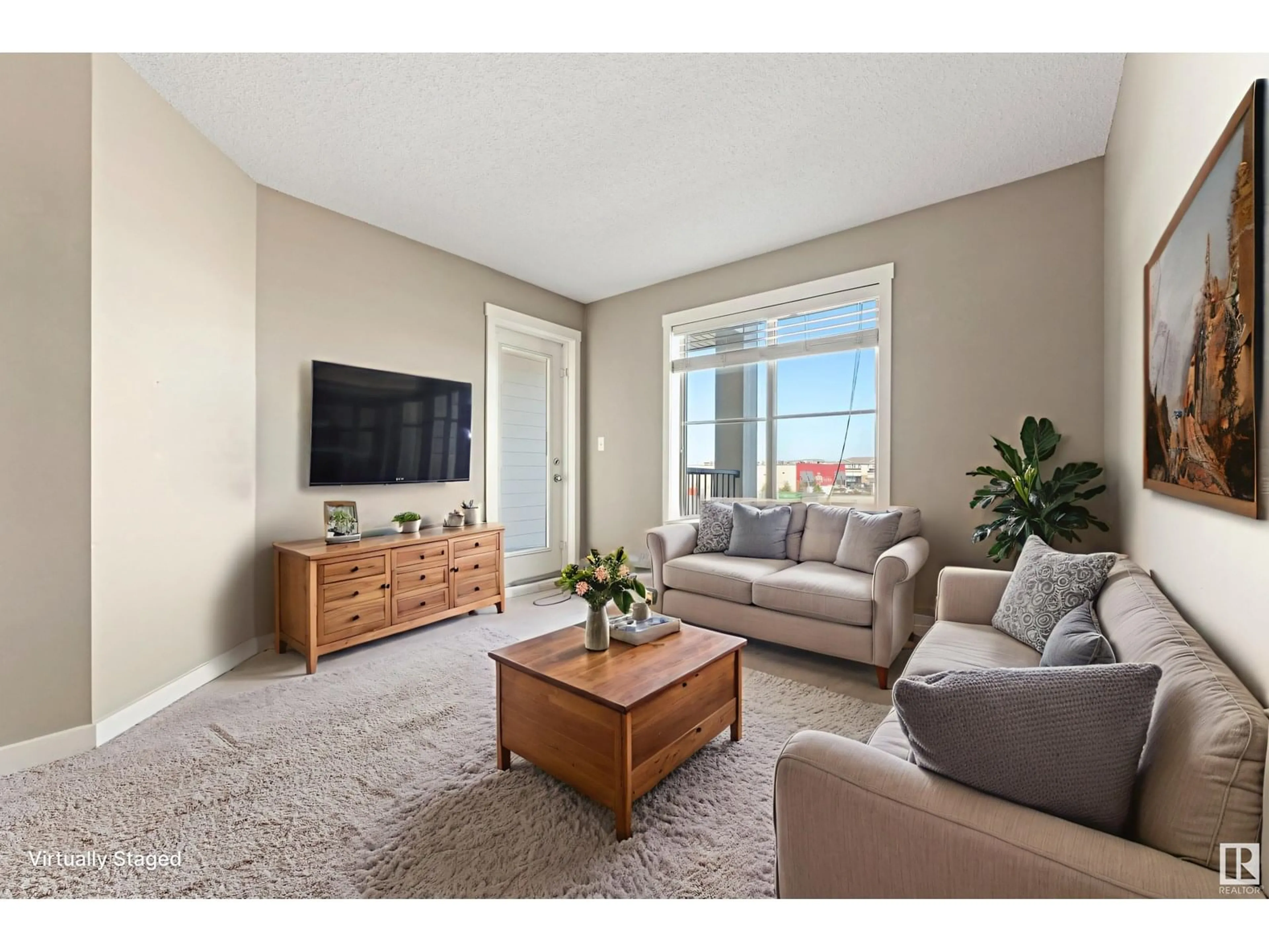 Living room with furniture, unknown for 313 - 5810 MULLEN PL, Edmonton Alberta T6R0W3