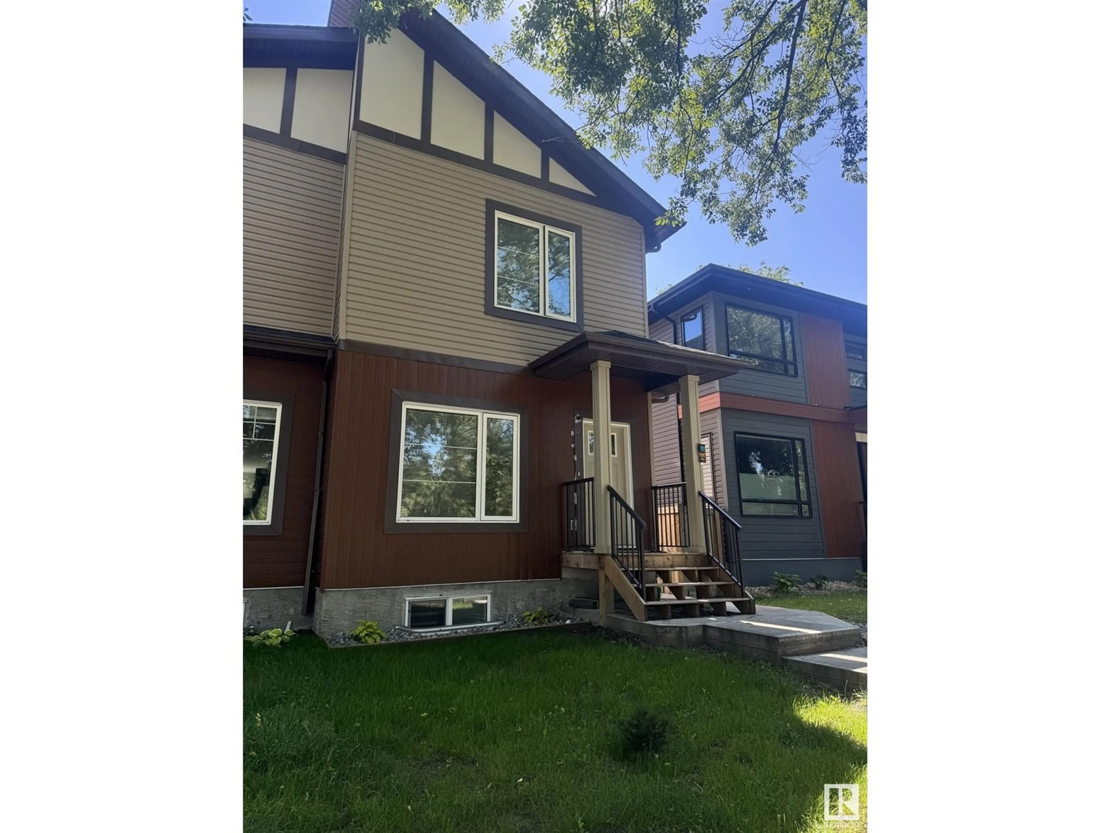Home with vinyl exterior material, street for 10947 73 AV, Edmonton Alberta T6G0C3