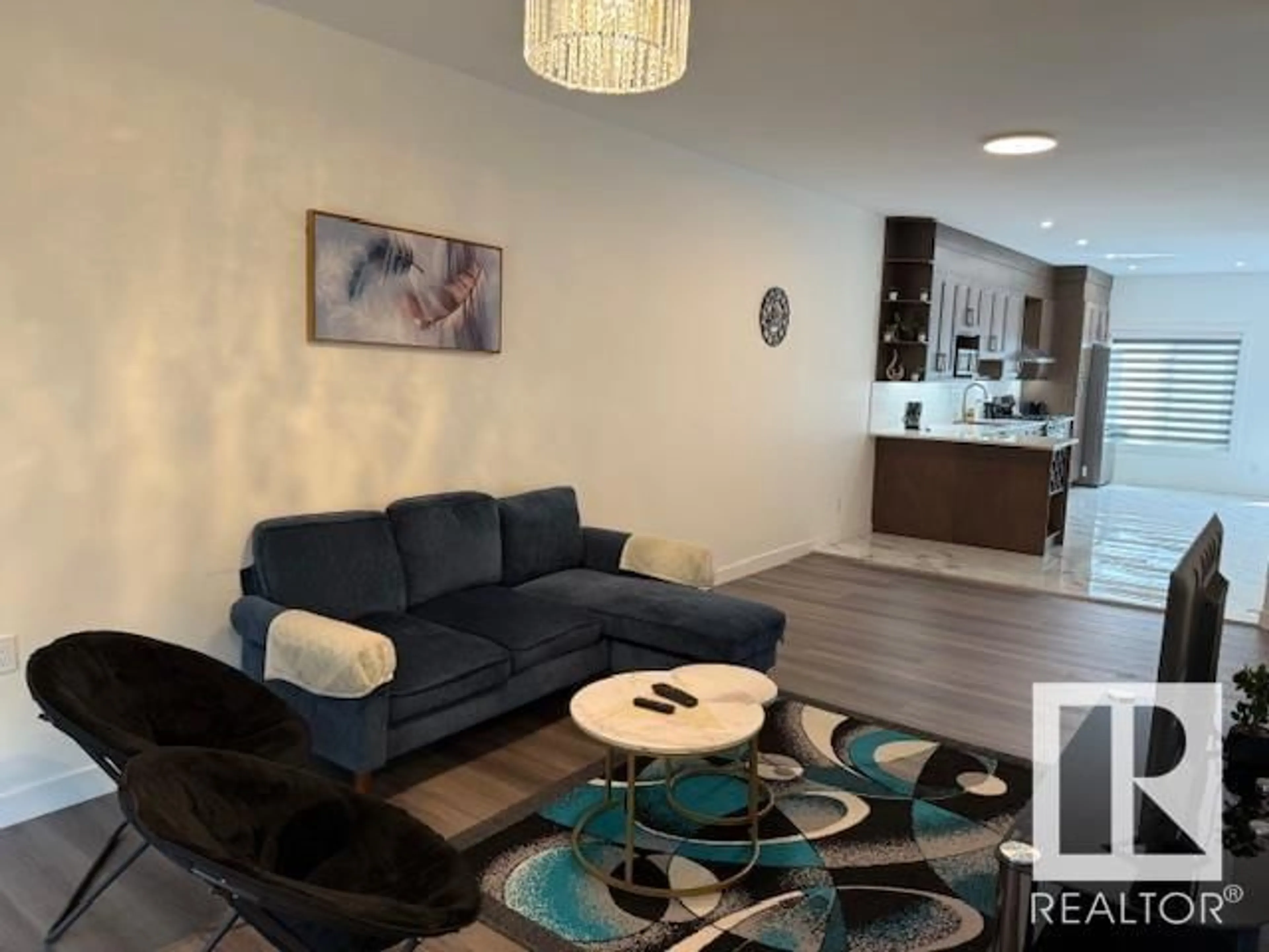 Living room with furniture, unknown for 10947 73 AV, Edmonton Alberta T6G0C3
