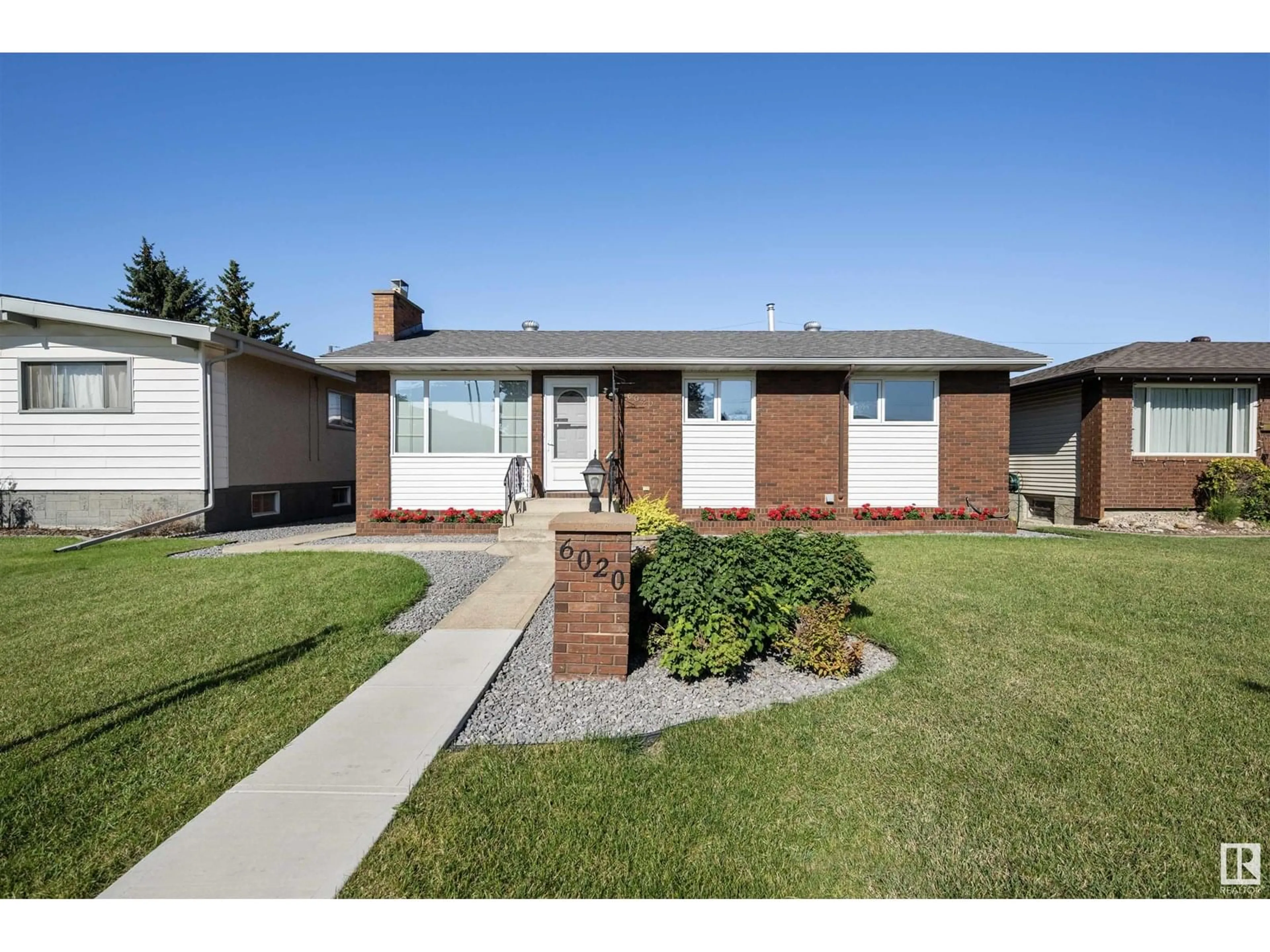 Home with brick exterior material, street for NW - 6020 105 ST, Edmonton Alberta T6H2N4