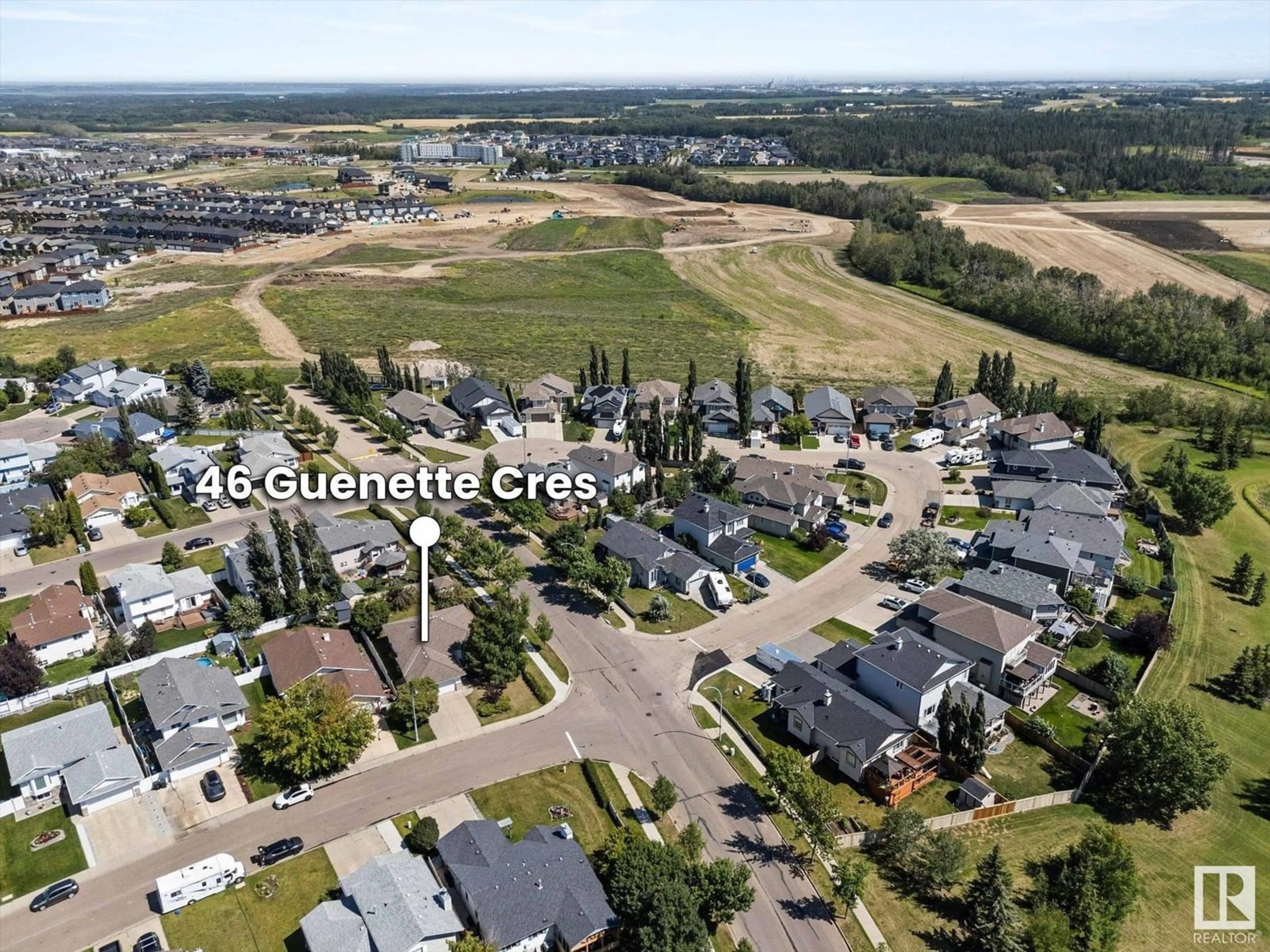 A pic from outside/outdoor area/front of a property/back of a property/a pic from drone, mountain view for 46 GUENETTE CR, Spruce Grove Alberta T7X3G9