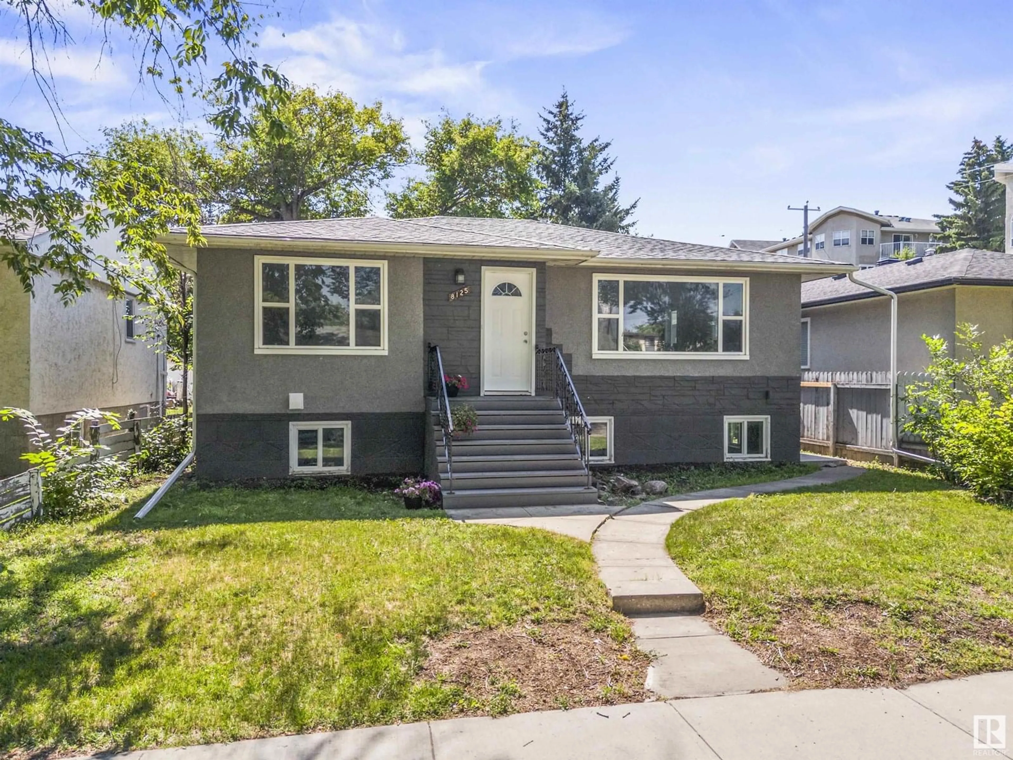 Home with vinyl exterior material, street for 8125 84 AV, Edmonton Alberta T6C1C7