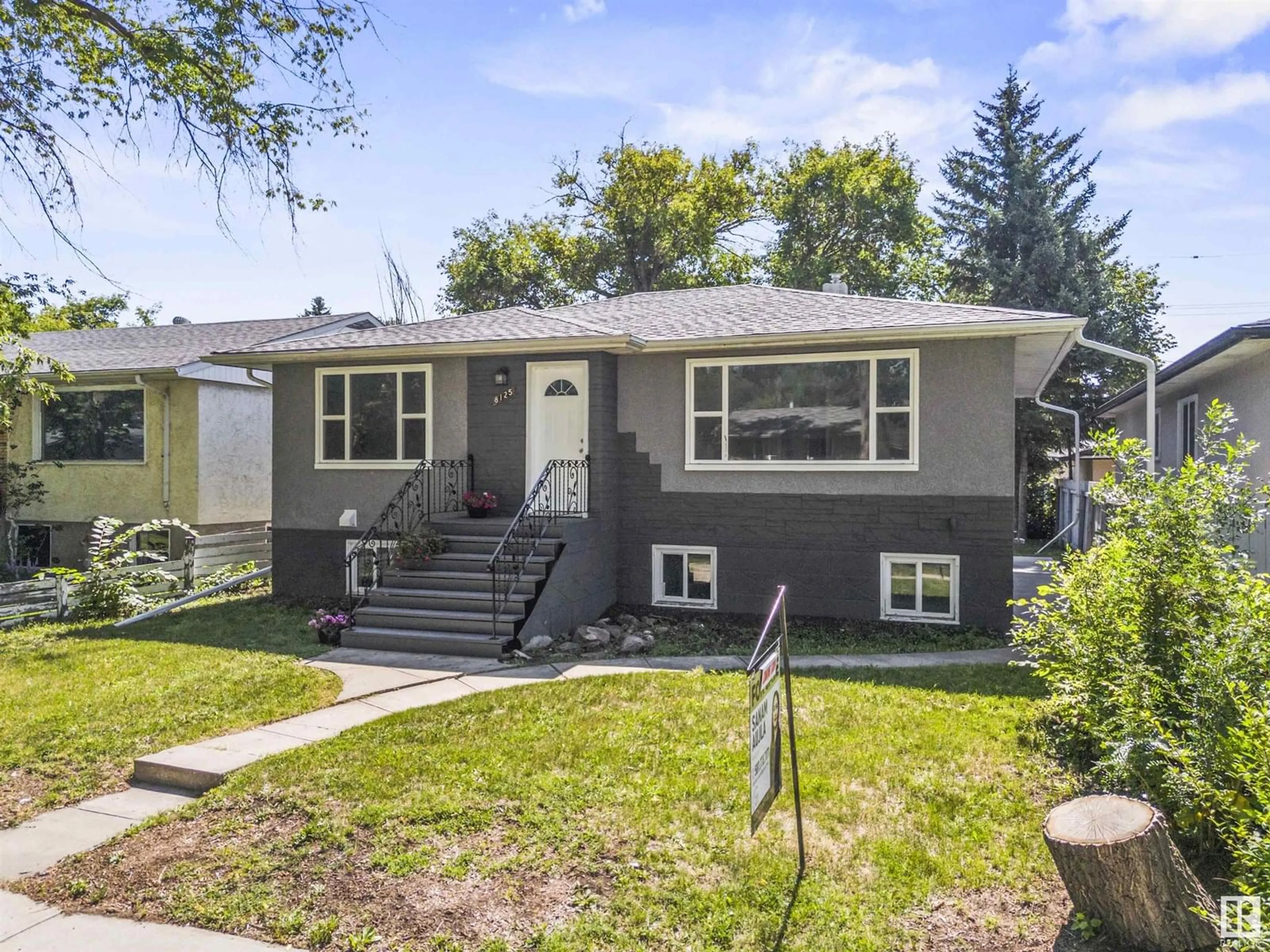 Home with vinyl exterior material, street for 8125 84 AV, Edmonton Alberta T6C1C7