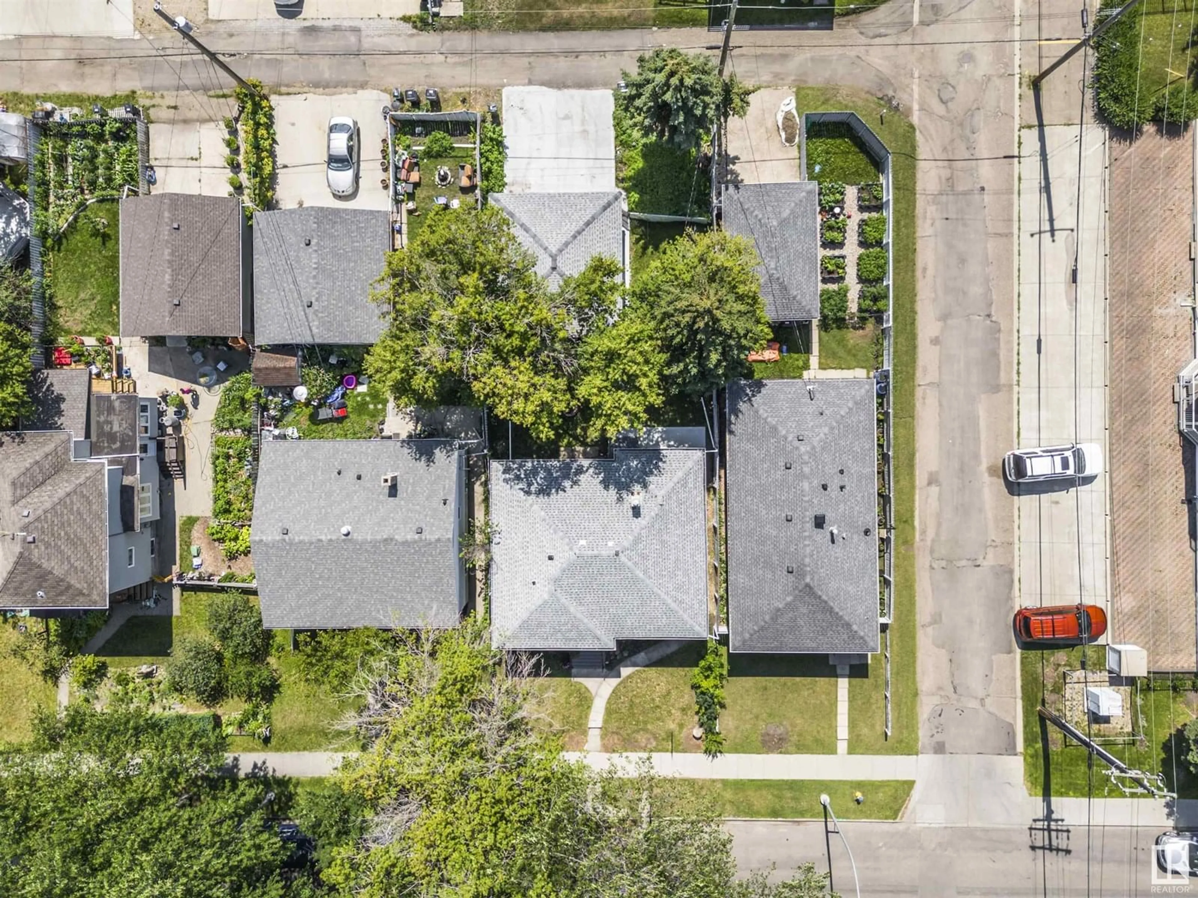 A pic from outside/outdoor area/front of a property/back of a property/a pic from drone, street for 8125 84 AV, Edmonton Alberta T6C1C7