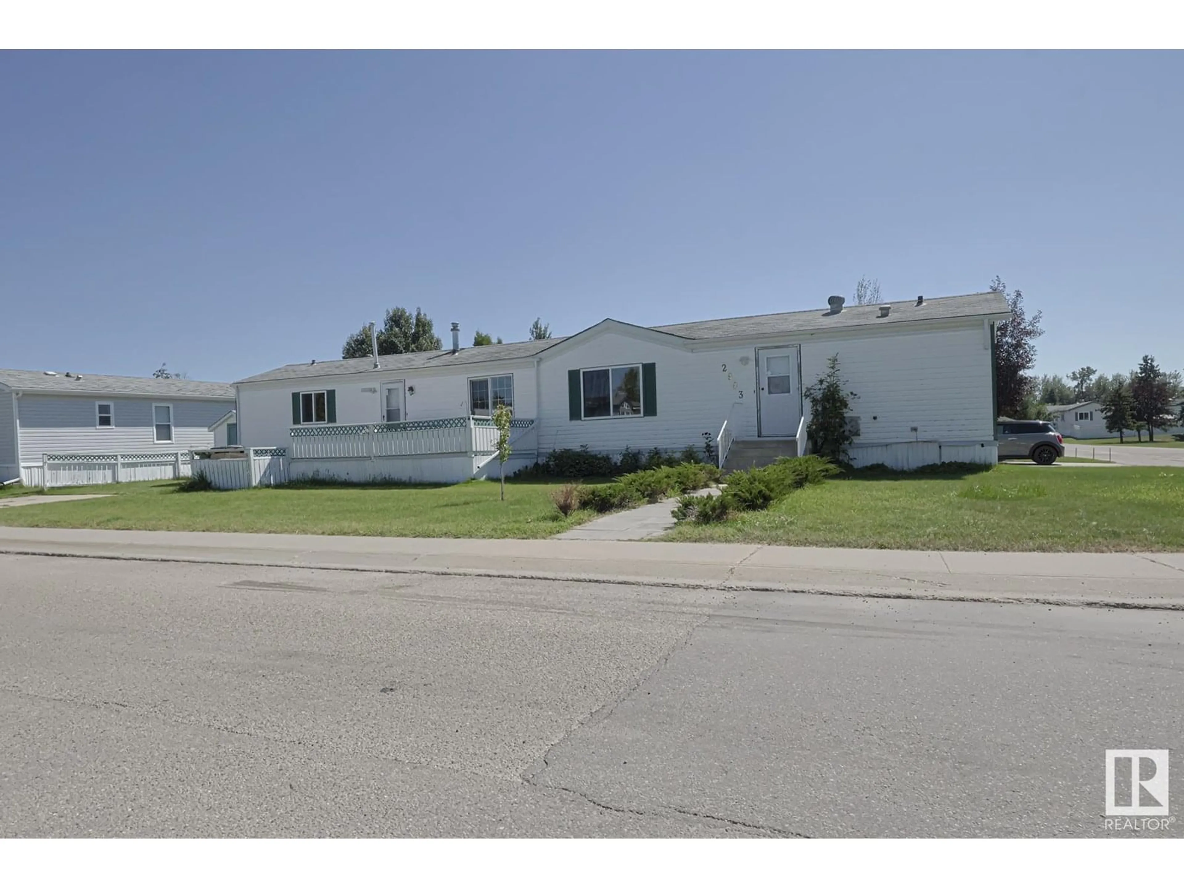 Home with vinyl exterior material, street for 2903 LAKEWOOD DRIVE, Edmonton Alberta T5S1T7
