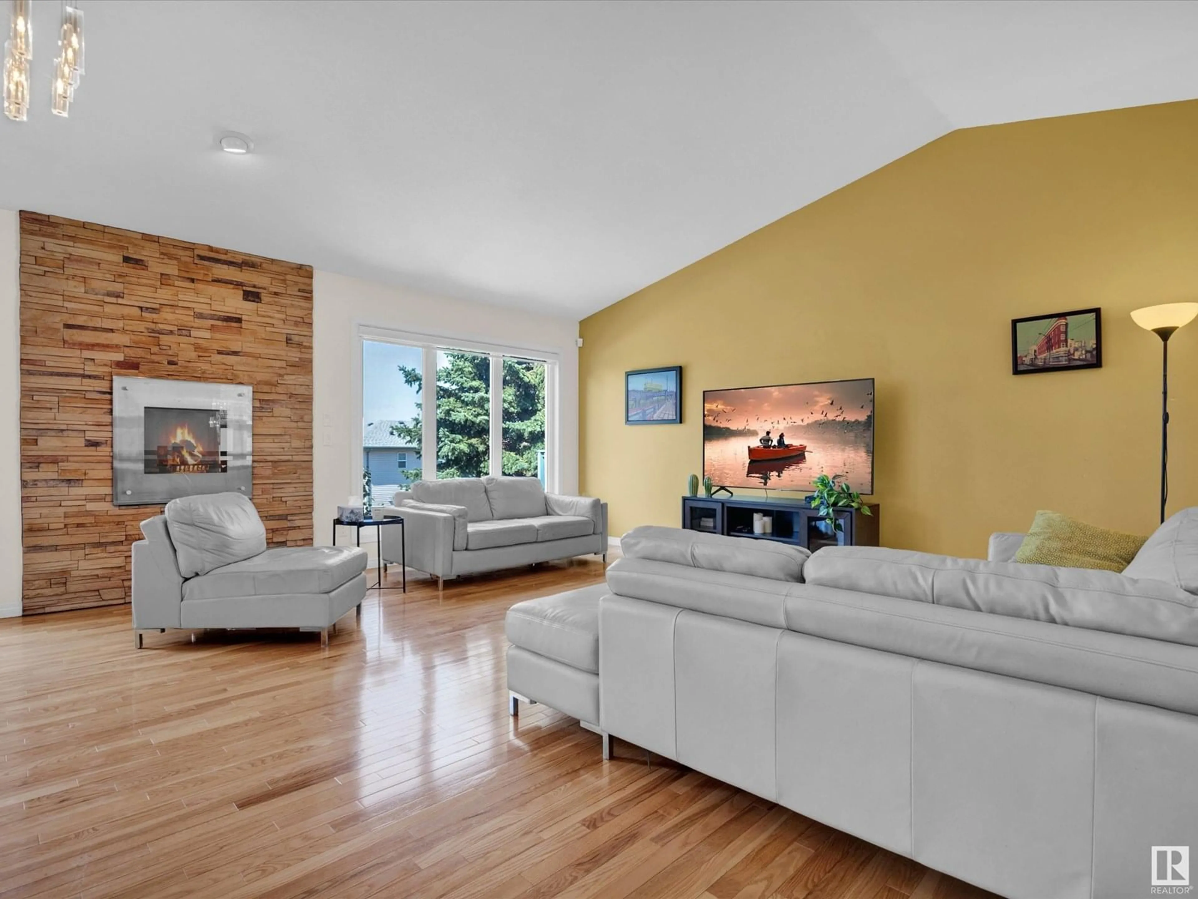 Living room with furniture, wood/laminate floor for #53 - 1130 FALCONER RD, Edmonton Alberta T6R2J6