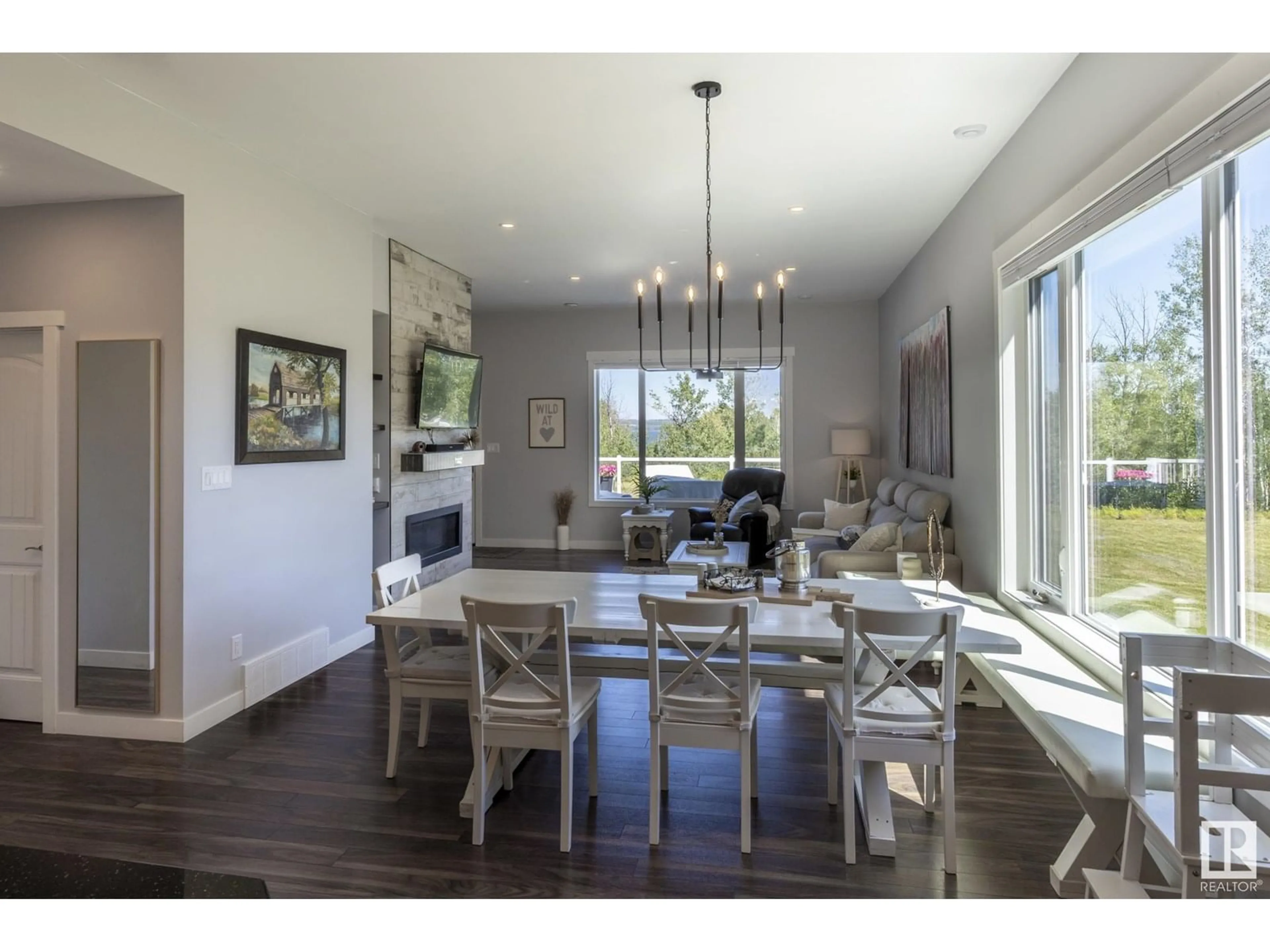 Dining room, wood/laminate floor for 14 KOS ST, Rural Parkland County Alberta T0E2B0