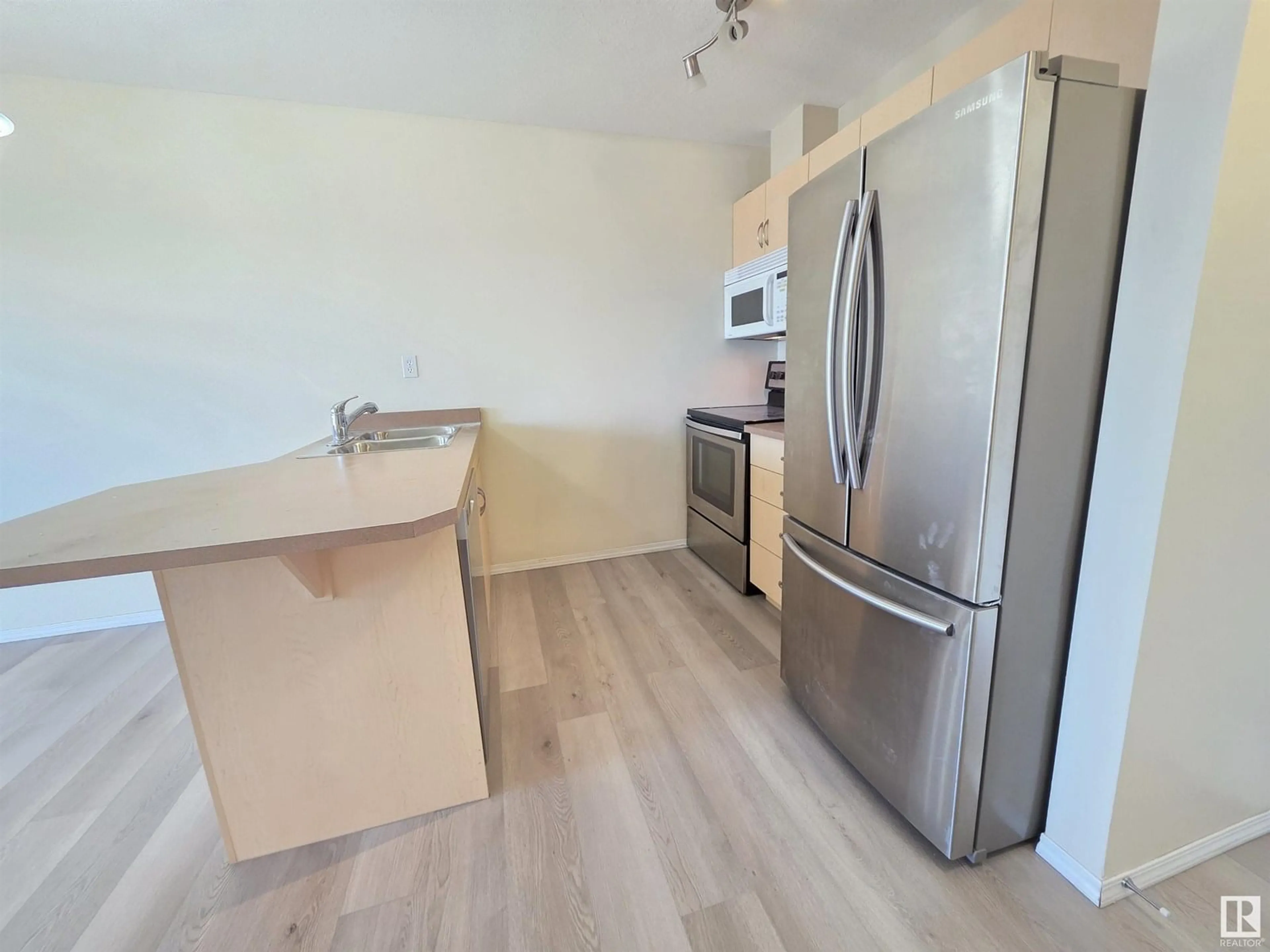 Standard kitchen, wood/laminate floor for #403 - 4310 33 ST, Stony Plain Alberta T7Z0A8