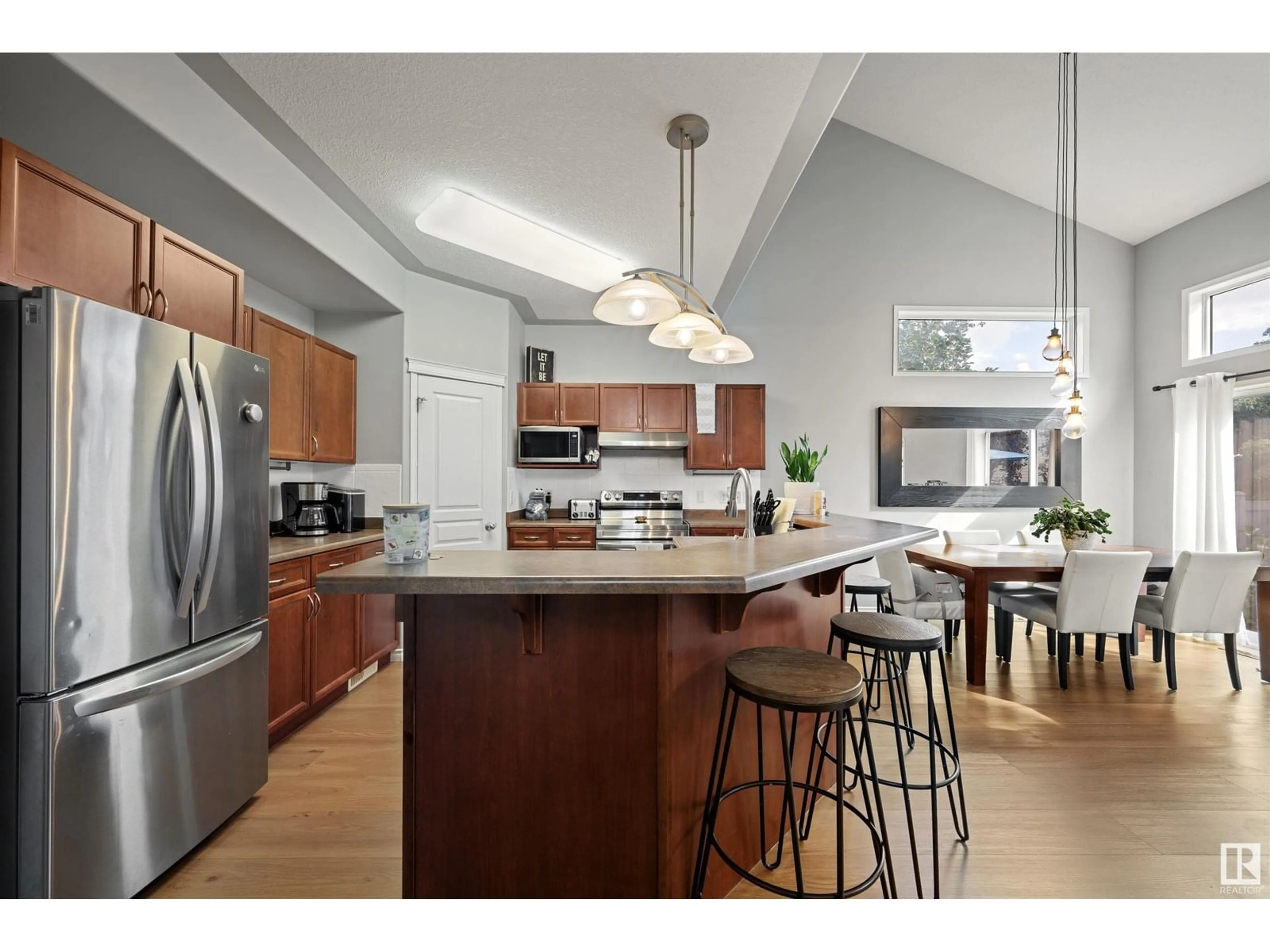 Open concept kitchen, wood/laminate floor for 42 ENGLISH WY, St. Albert Alberta T8N7G7