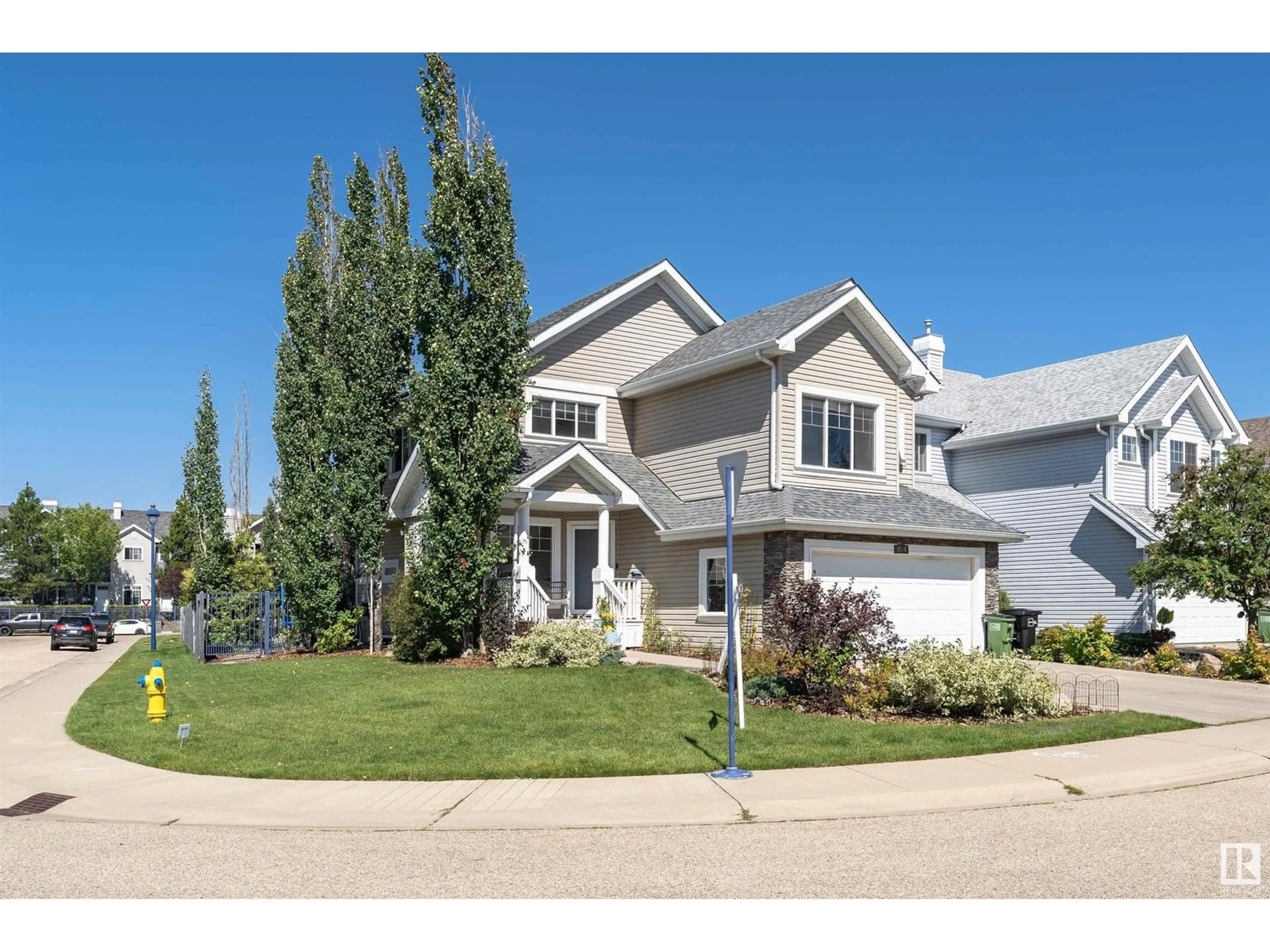 Home with vinyl exterior material, street for SW - 8316 12 AV, Edmonton Alberta T6X1E3