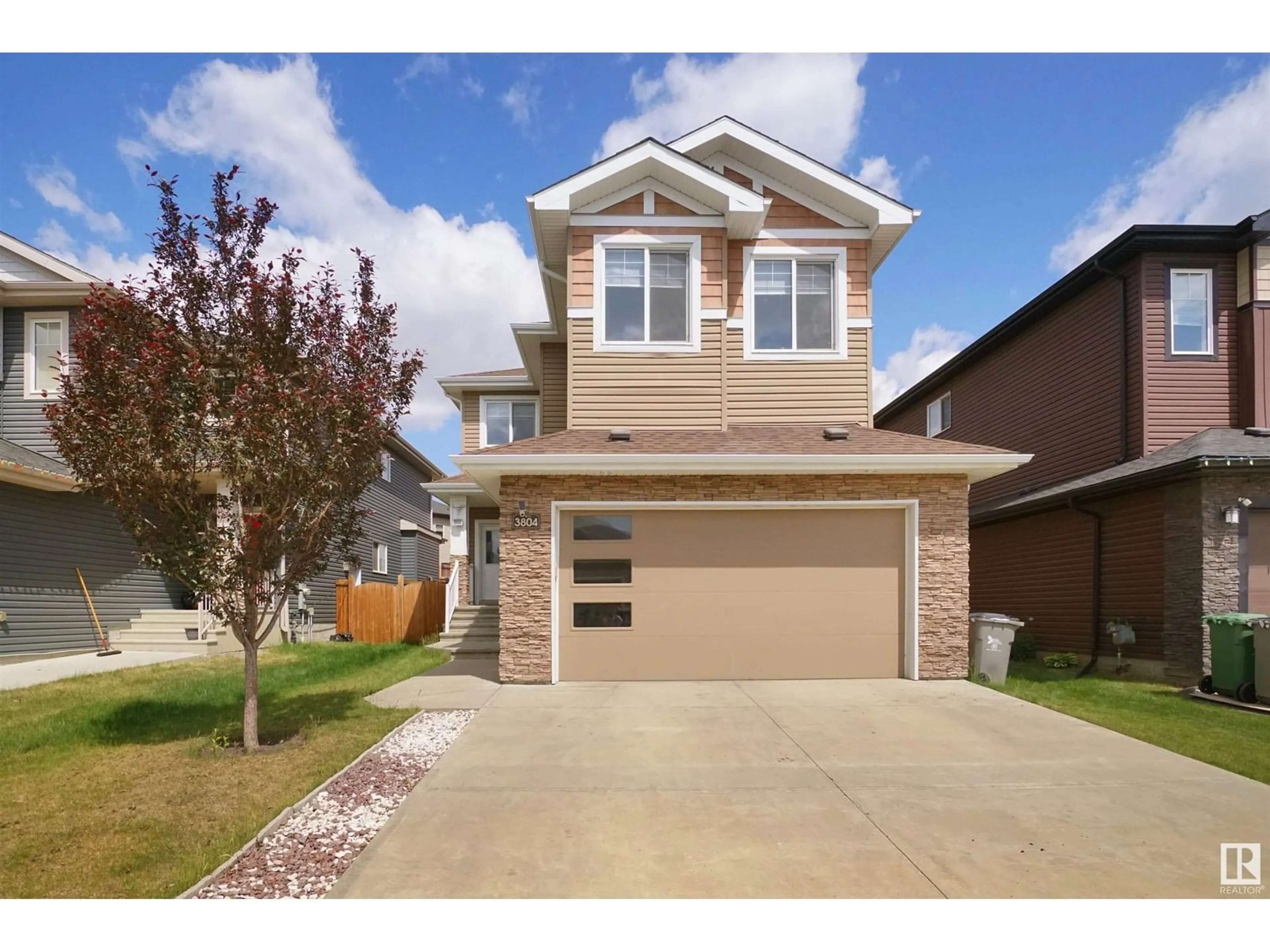 Home with vinyl exterior material, street for 3808 48 AV, Beaumont Alberta T4X1Y8