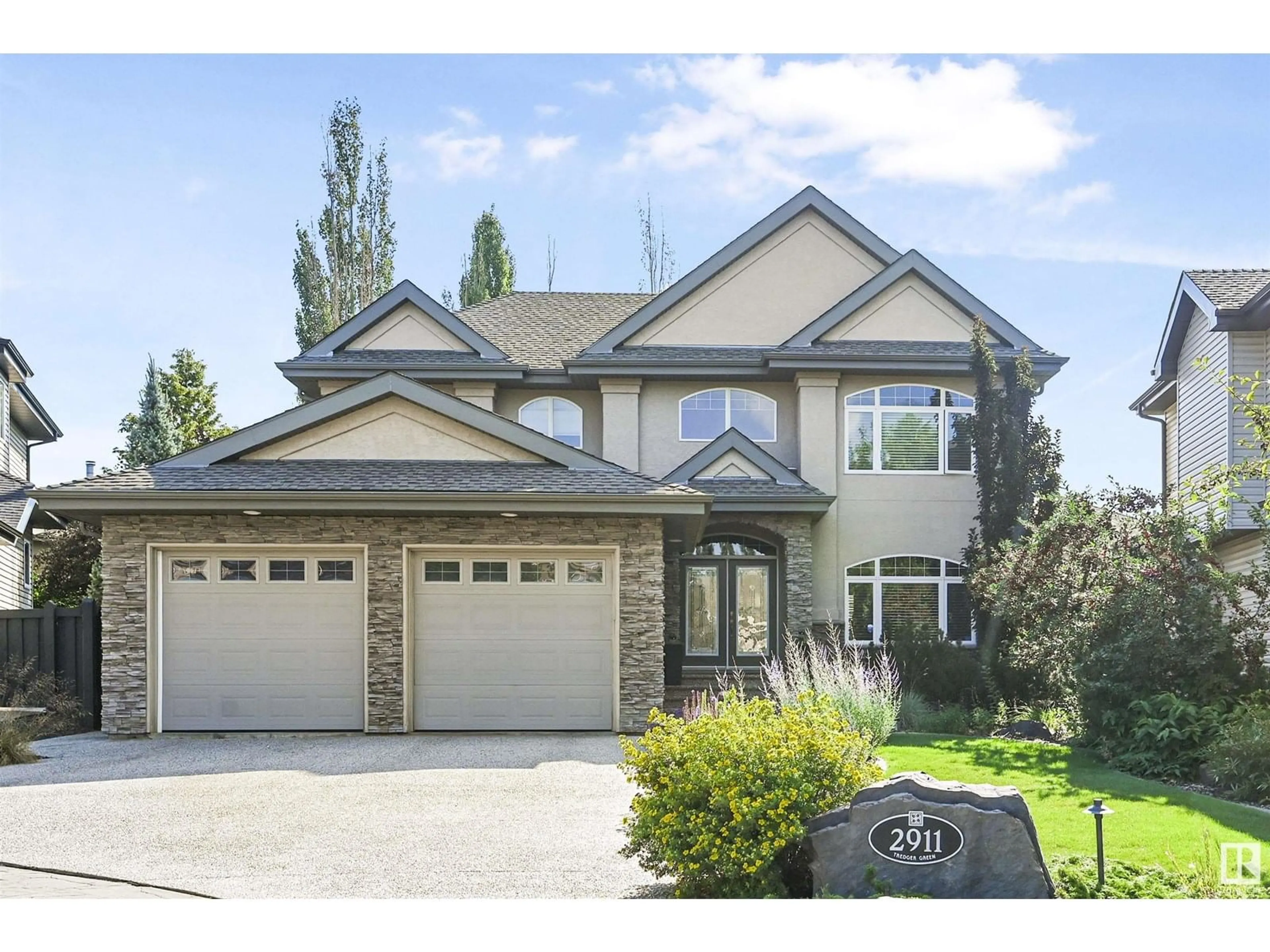 Home with vinyl exterior material, street for 2911 TREDGER GR, Edmonton Alberta T6R3R7