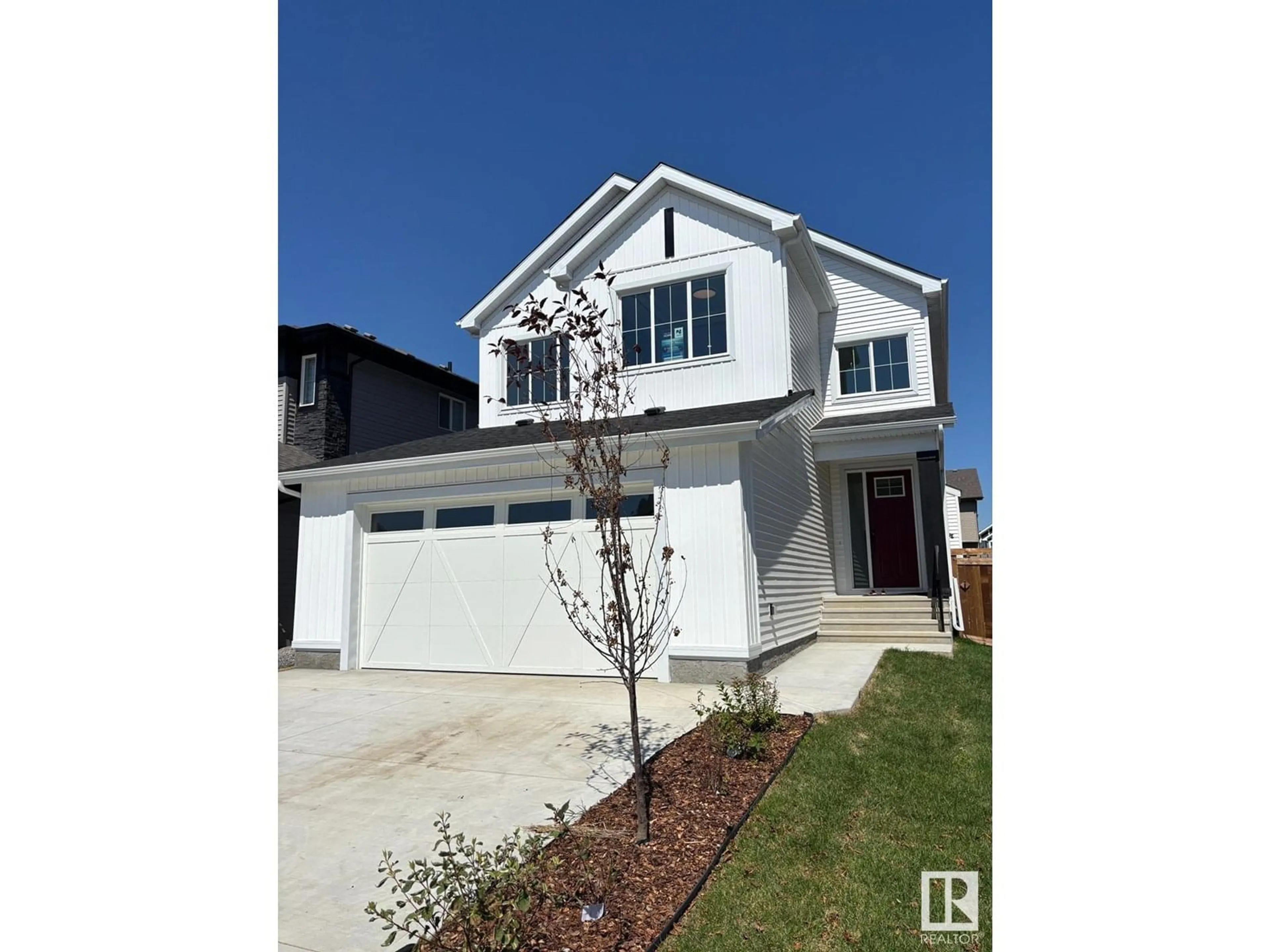 Home with vinyl exterior material, street for 22530 98A AV, Edmonton Alberta T5T7R7