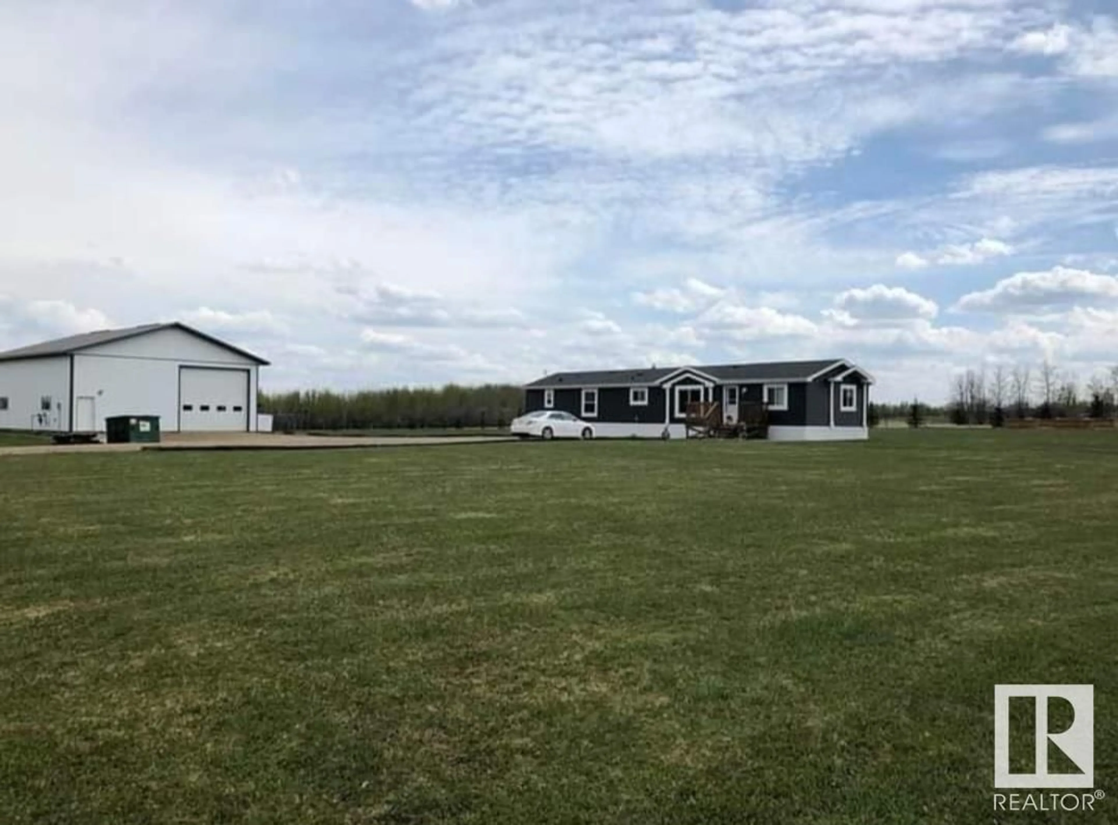 A pic from outside/outdoor area/front of a property/back of a property/a pic from drone, building for 7325 TWP 505, Rural Brazeau County Alberta T7A2A2