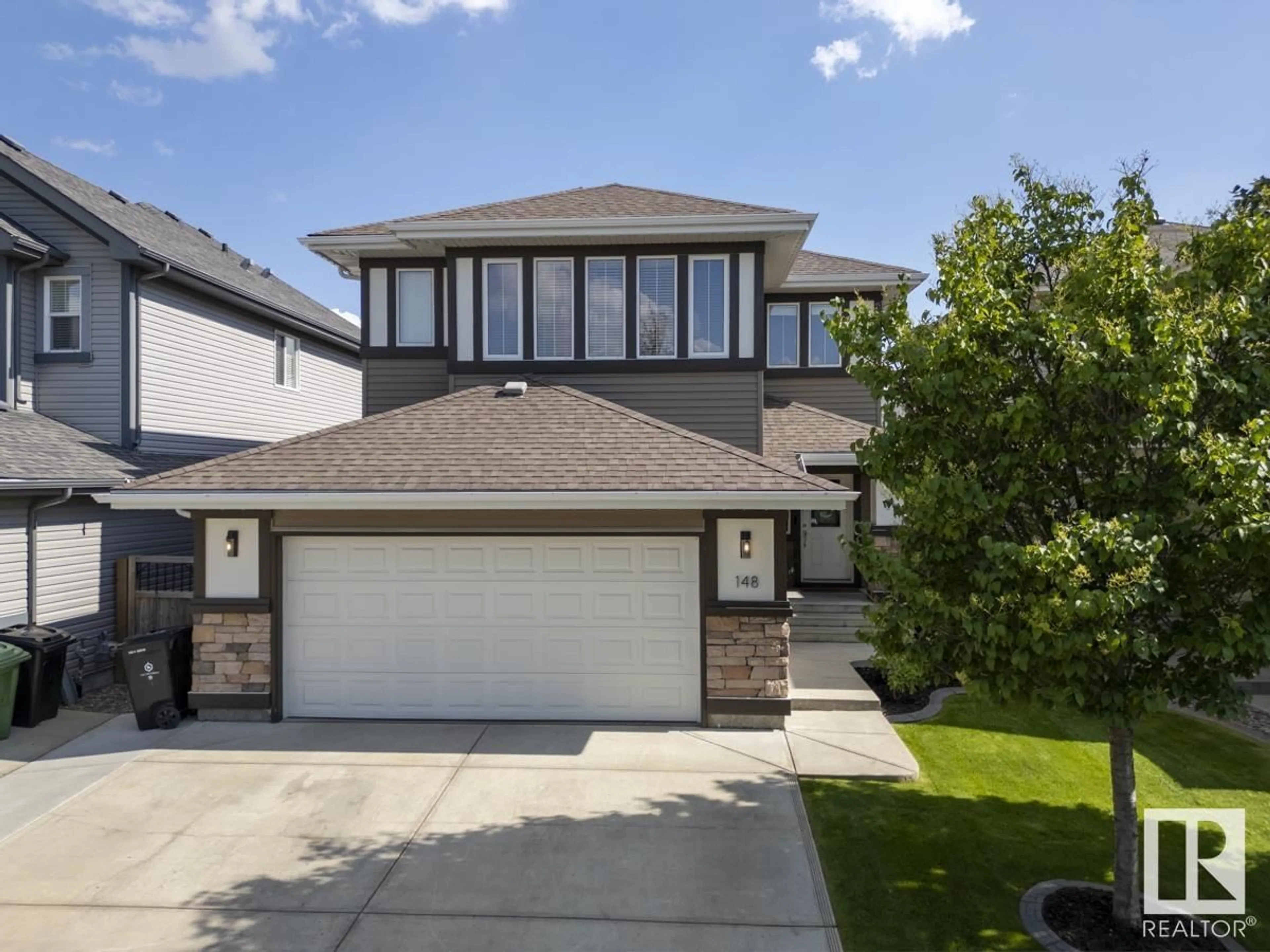 Home with vinyl exterior material, street for 148 BECKER CR, Fort Saskatchewan Alberta T8L0C2