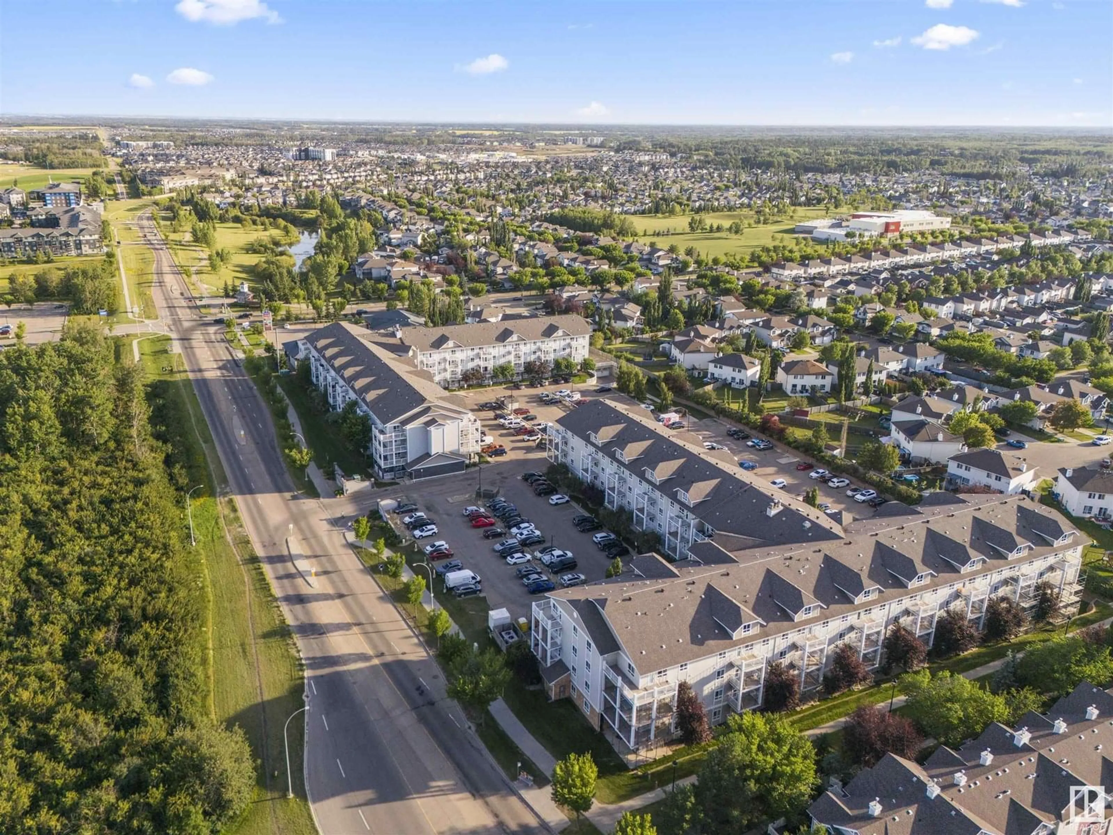 A pic from outside/outdoor area/front of a property/back of a property/a pic from drone, unknown for 5350 - 210 199 ST, Edmonton Alberta T6M0A4