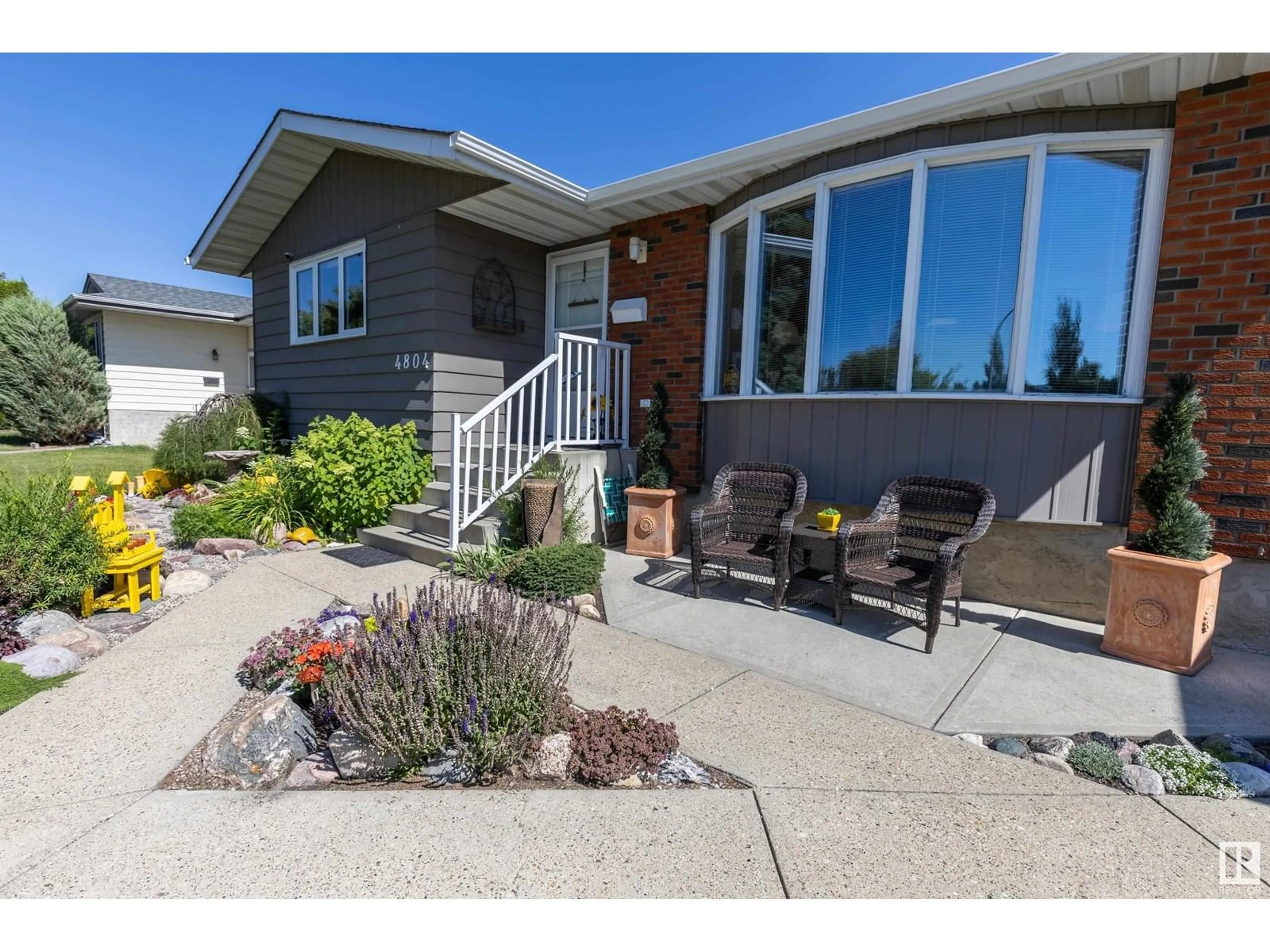 Home with vinyl exterior material, street for 4804 11A AV, Edmonton Alberta T6L4A8