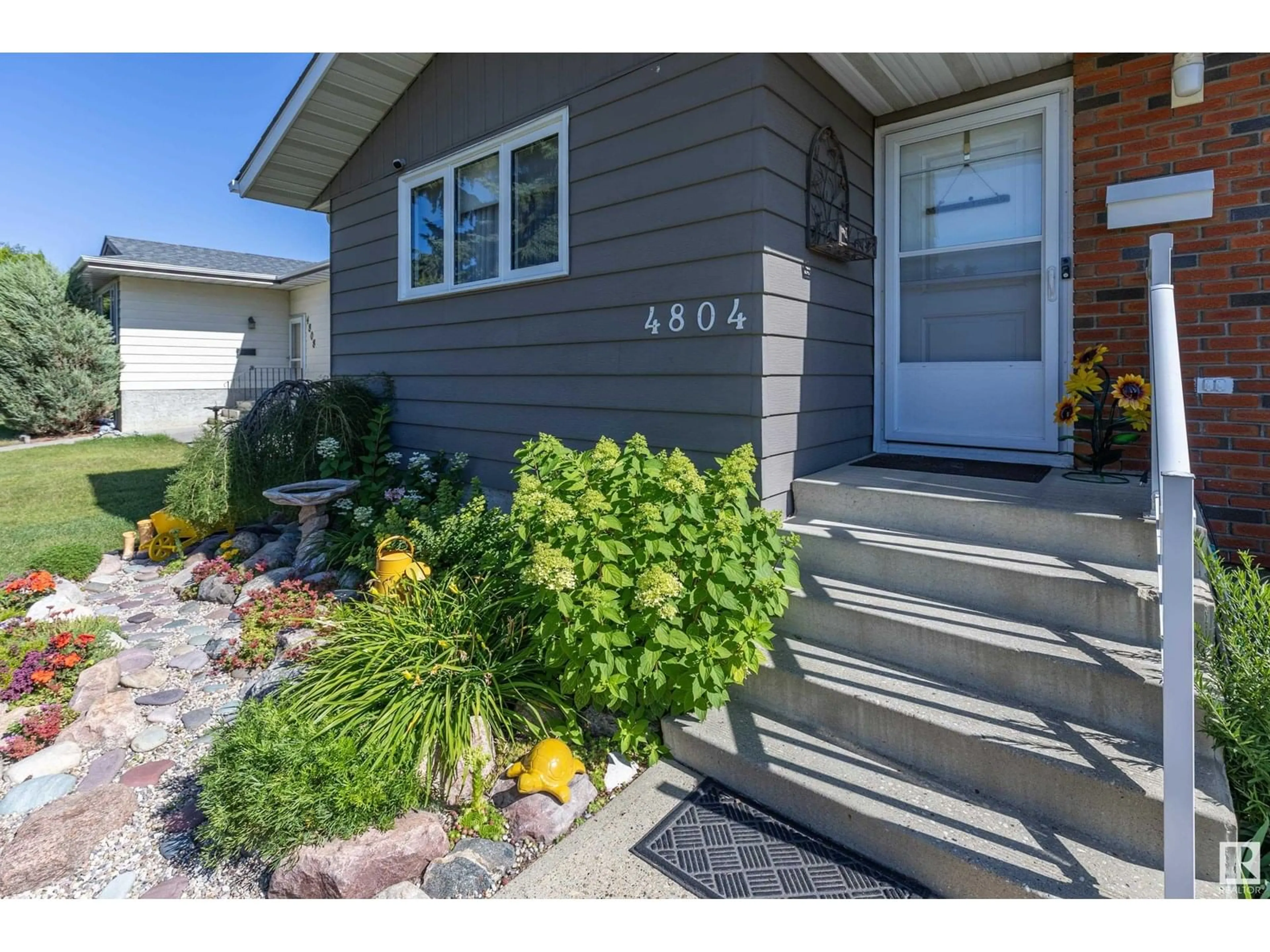 Home with vinyl exterior material, street for 4804 11A AV, Edmonton Alberta T6L4A8