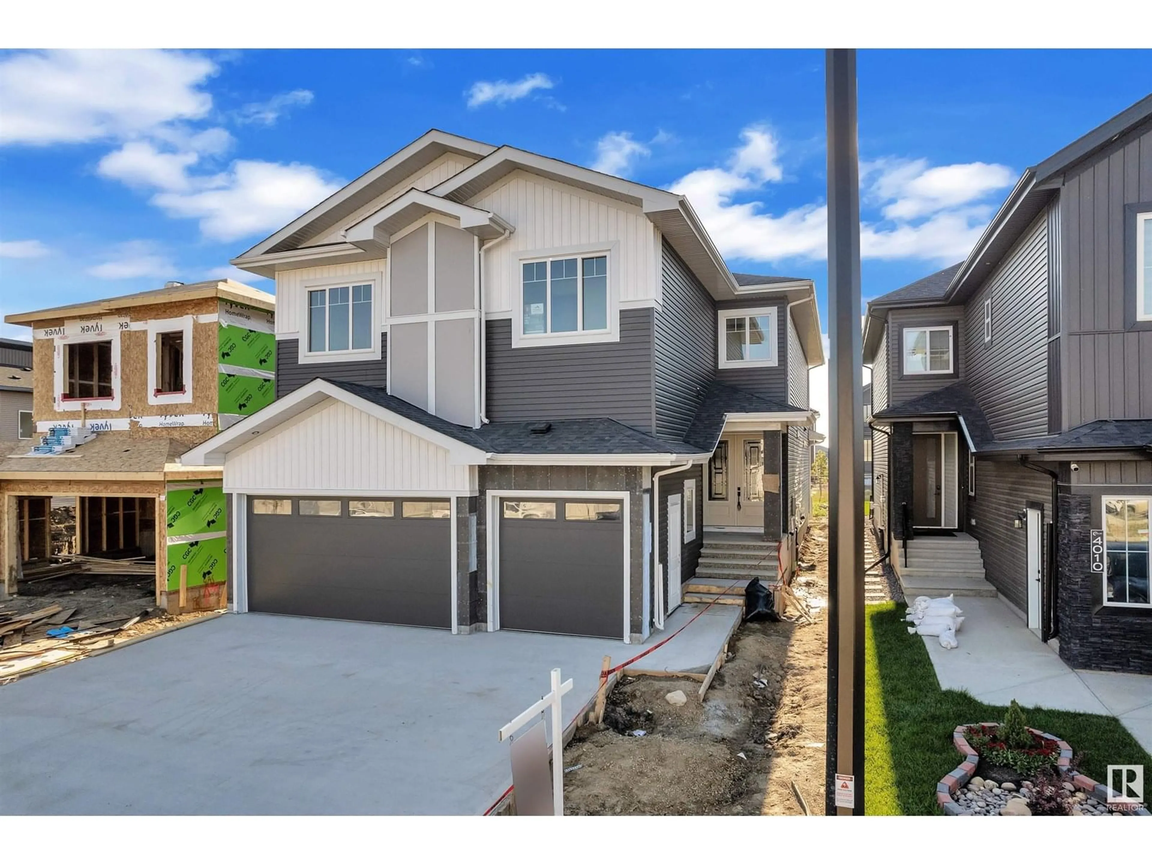 Home with vinyl exterior material, street for 4008 40 ST, Beaumont Alberta T4X2A8