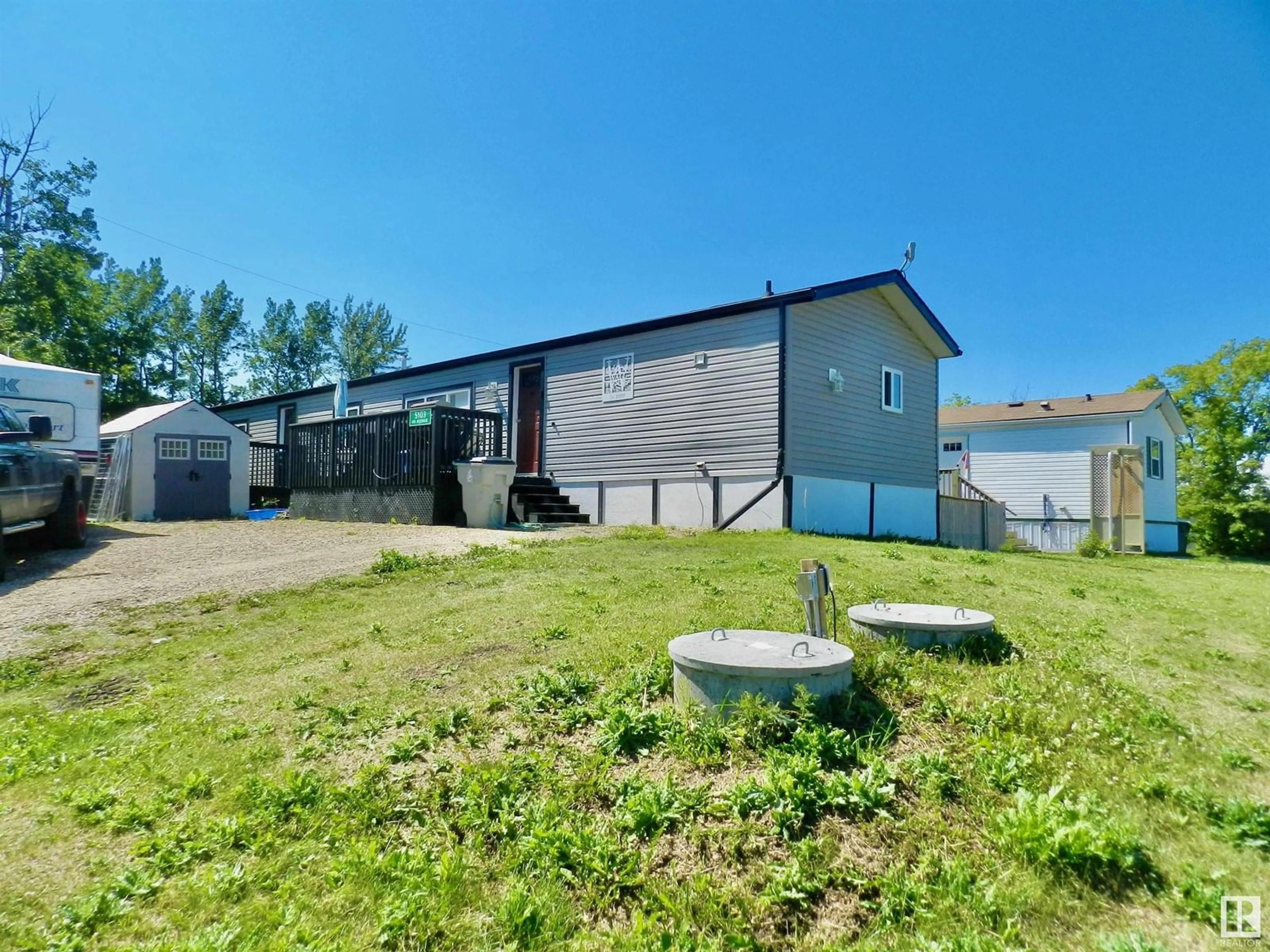 A pic from outside/outdoor area/front of a property/back of a property/a pic from drone, building for 5103 49 AV, Busby Alberta T0G0H0