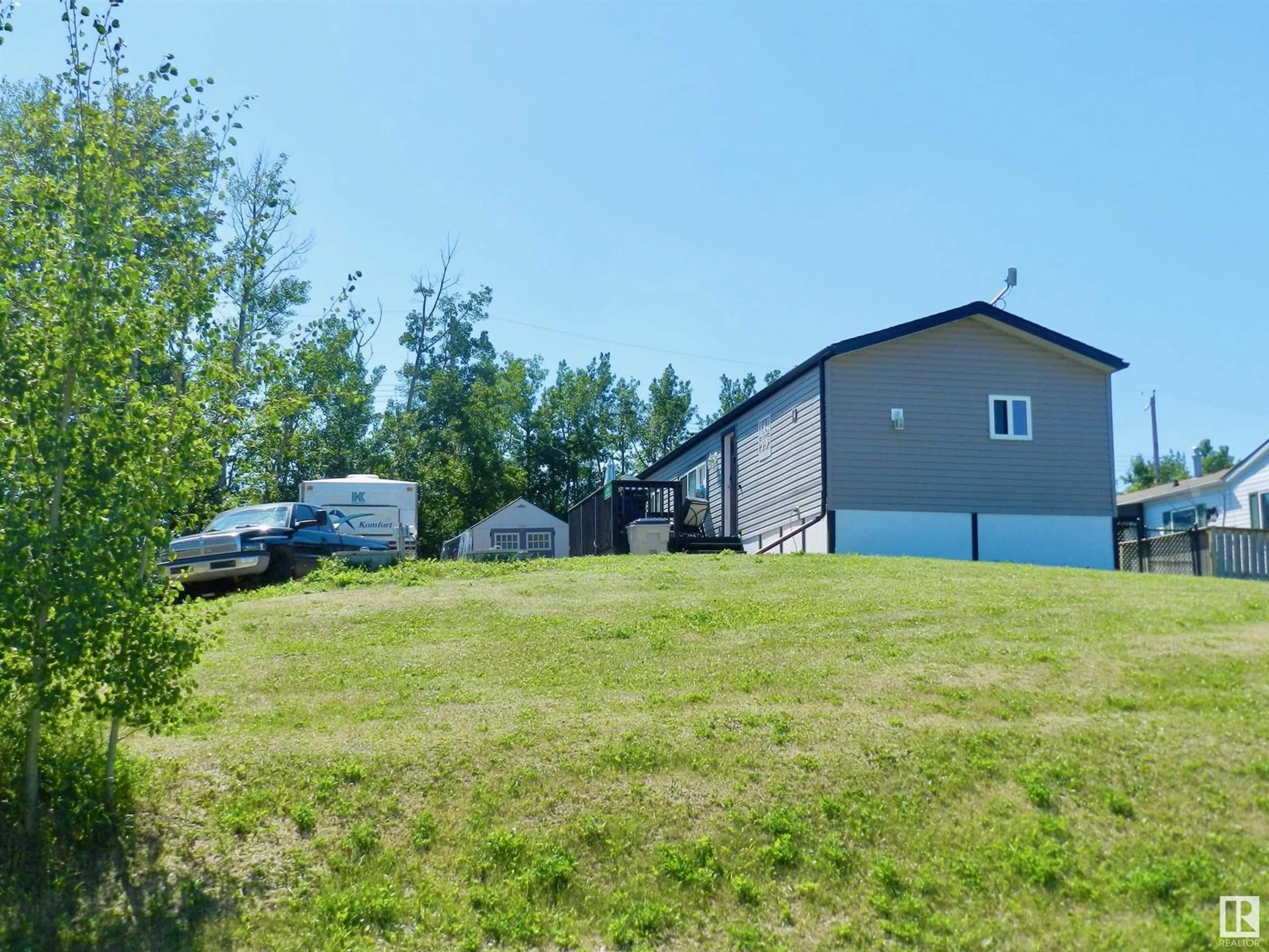 A pic from outside/outdoor area/front of a property/back of a property/a pic from drone, unknown for 5103 49 AV, Busby Alberta T0G0H0